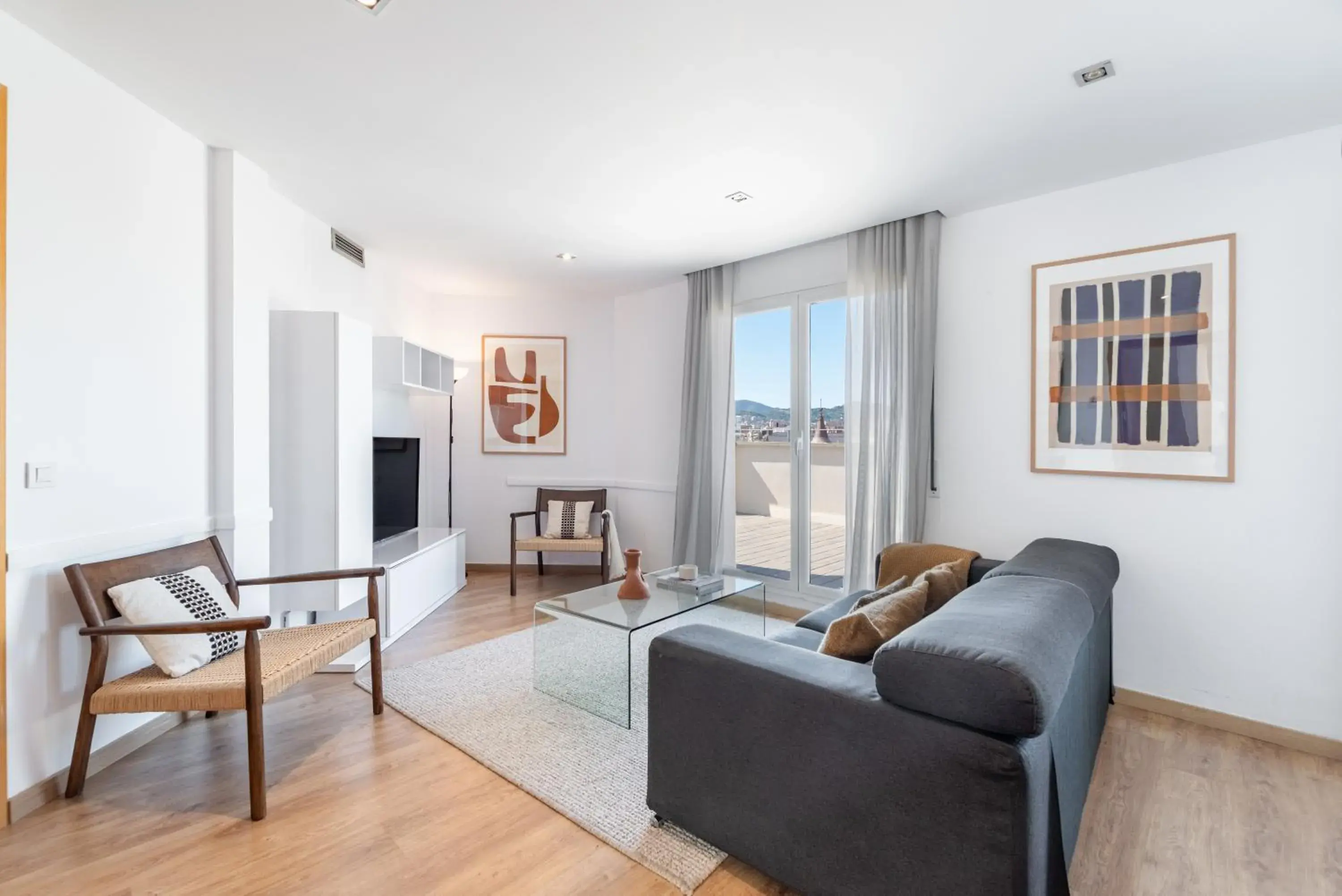 Living room in The Corner Apartments by Aspasios Living room in The Corner Apartments by Aspasios