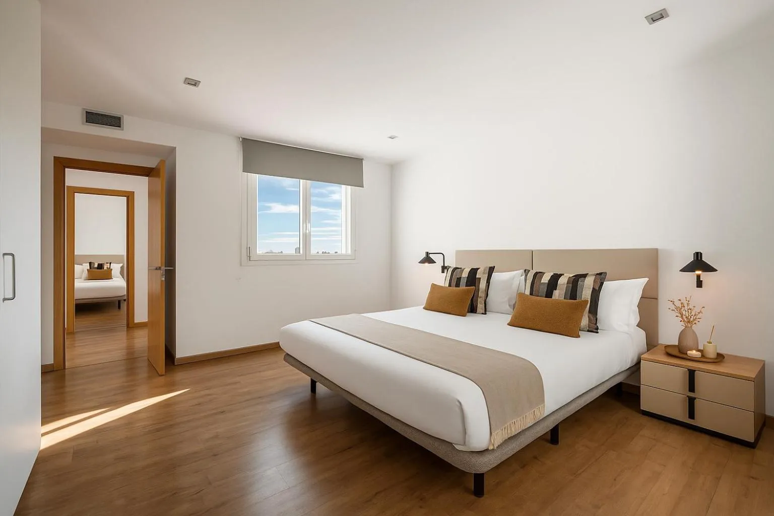 Bedroom, Bed in The Corner Apartments by Aspasios