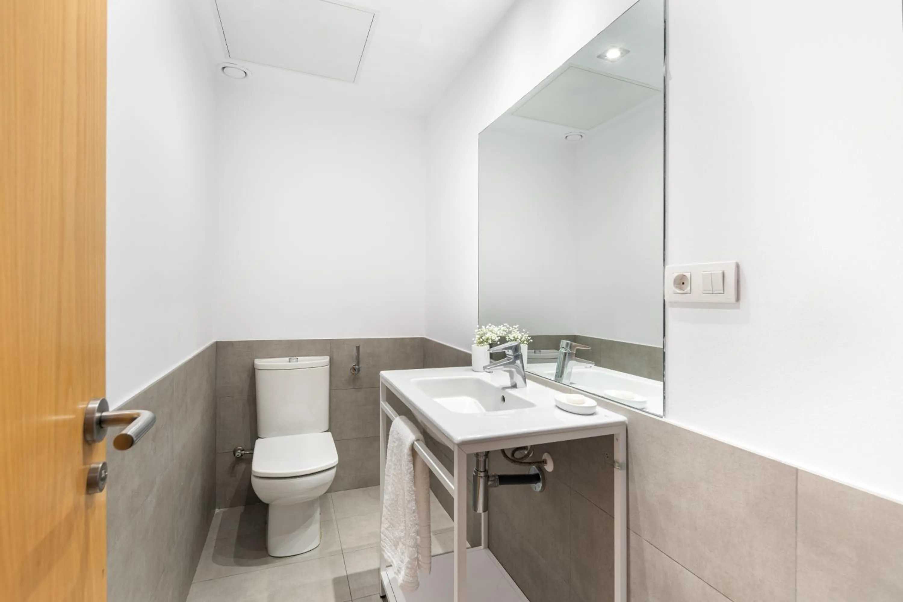 Bathroom in The Corner Apartments by Aspasios