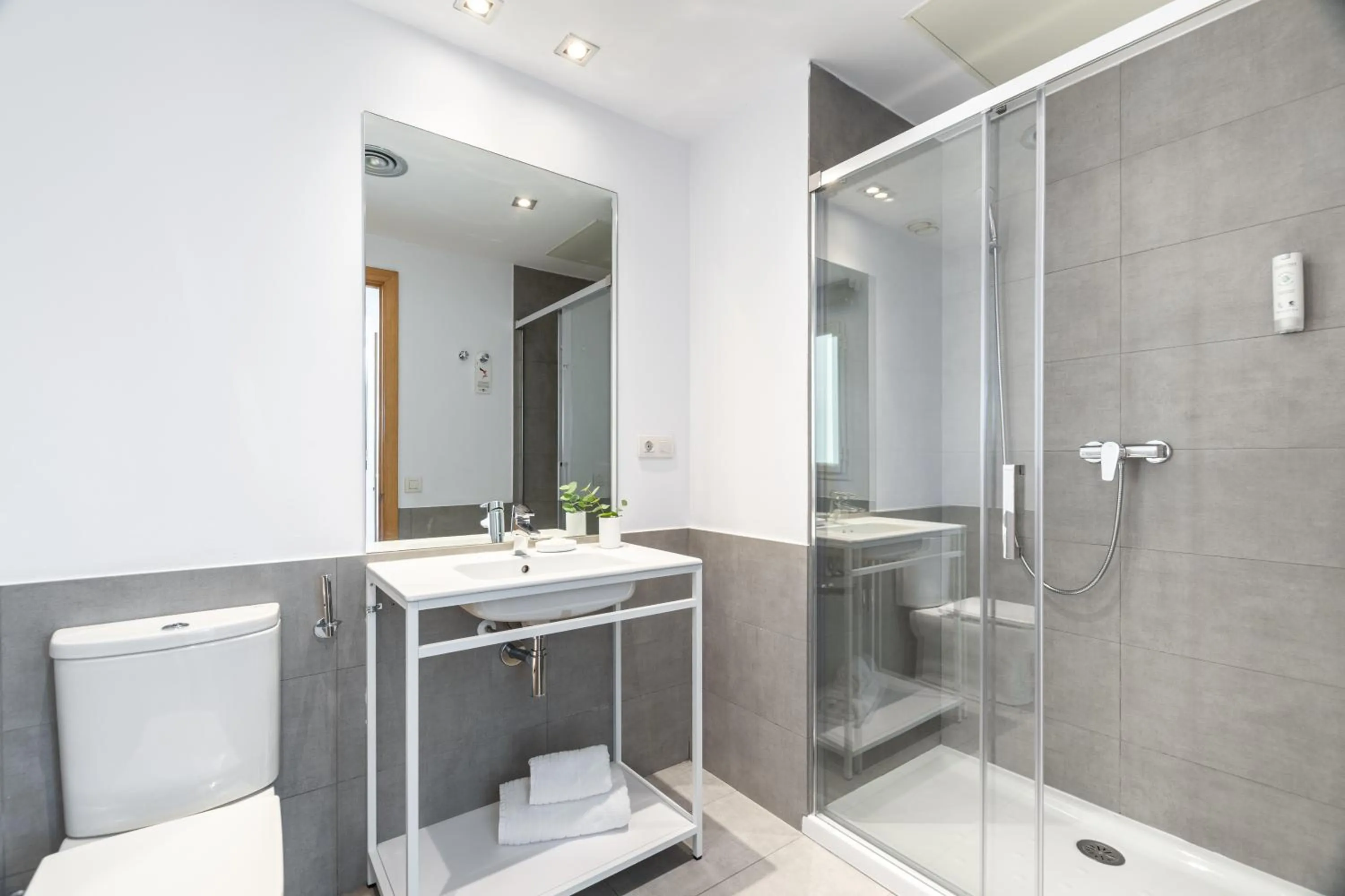 Bathroom in The Corner Apartments by Aspasios