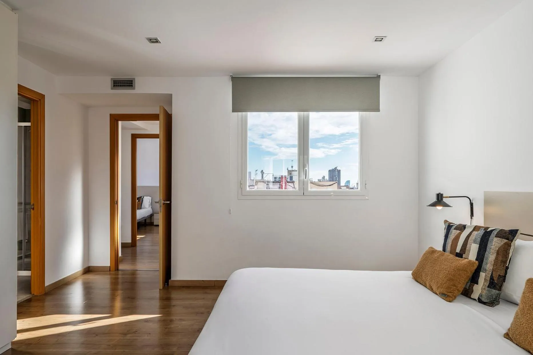 Bedroom, Bed in The Corner Apartments by Aspasios