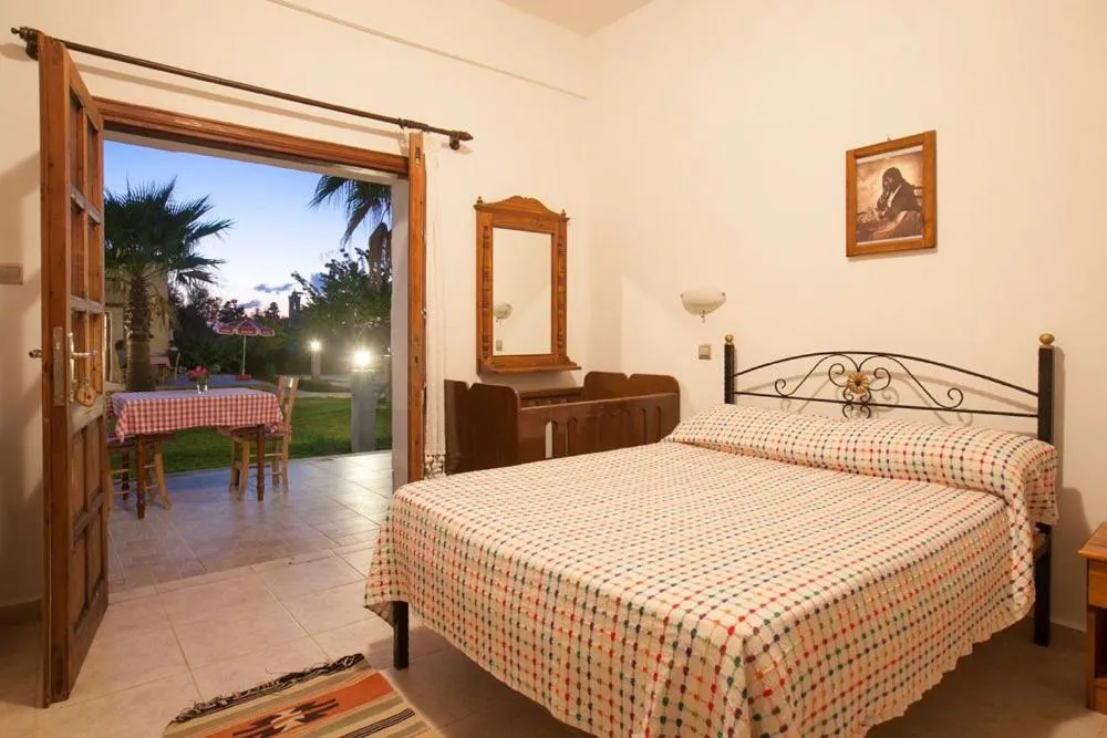 Bed in Glaro Garden Hotel