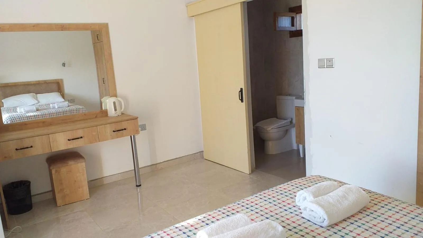 Bed in Glaro Garden Hotel