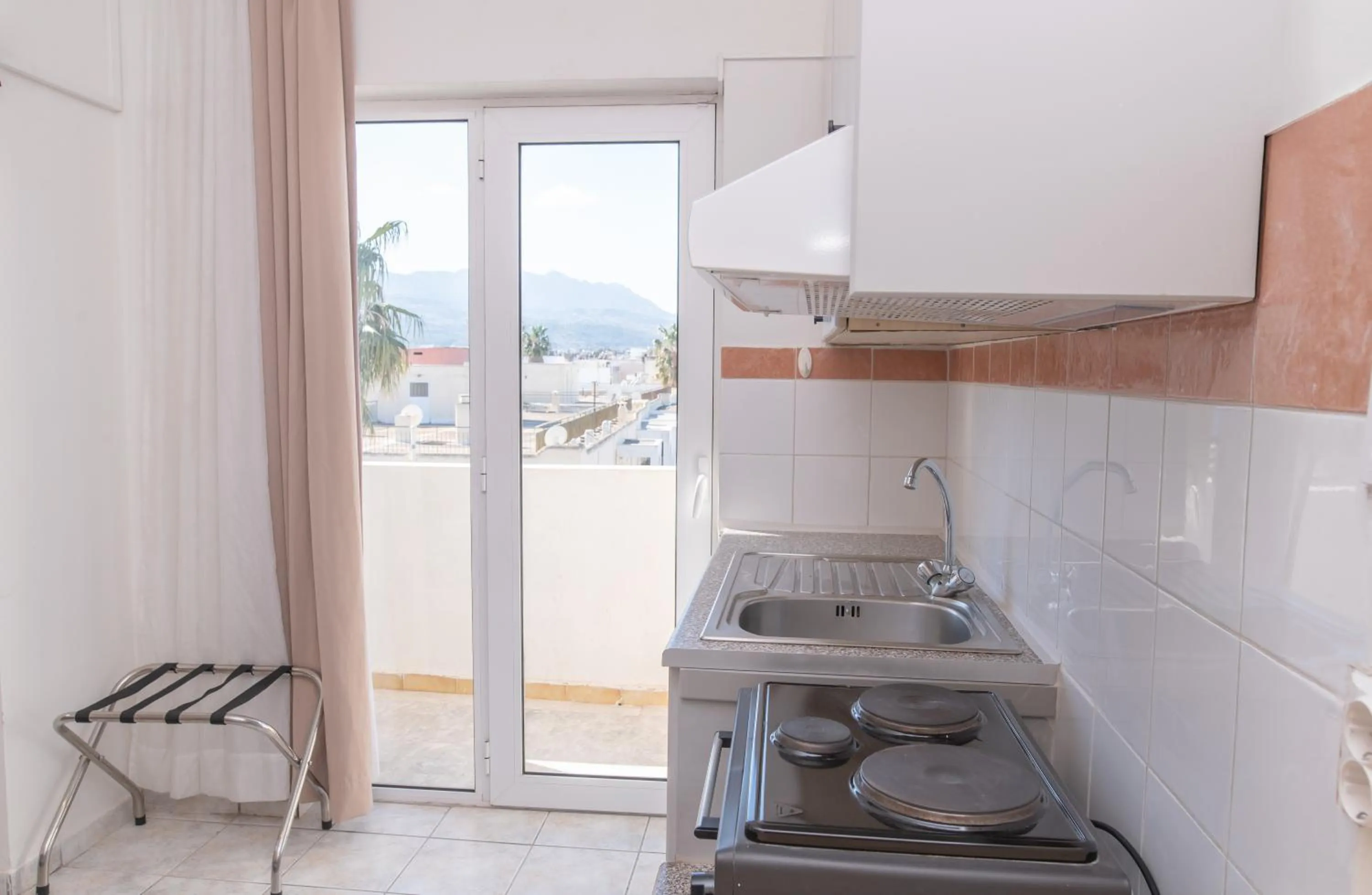 kitchen in Achilleas Hotel Apartments