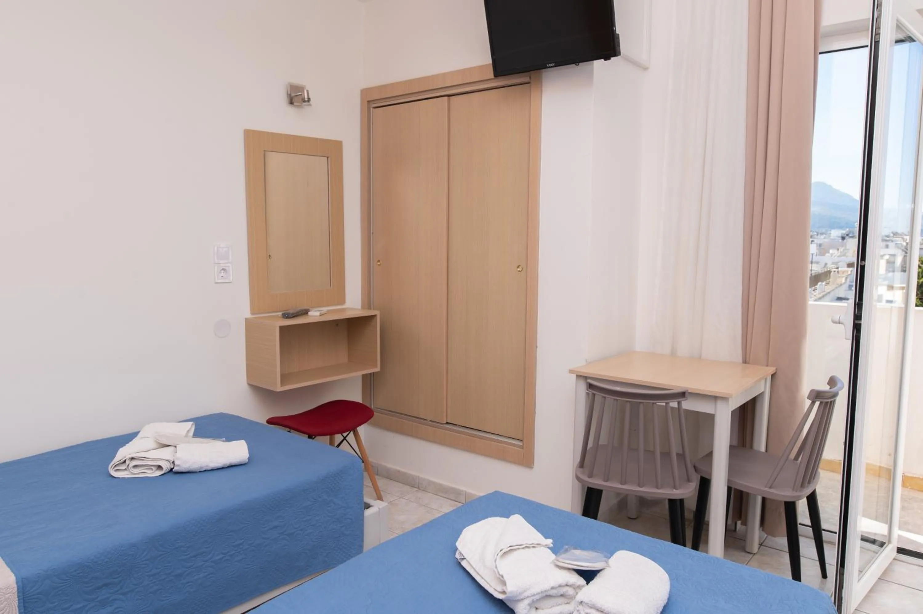 wardrobe, Bed in Achilleas Hotel Apartments