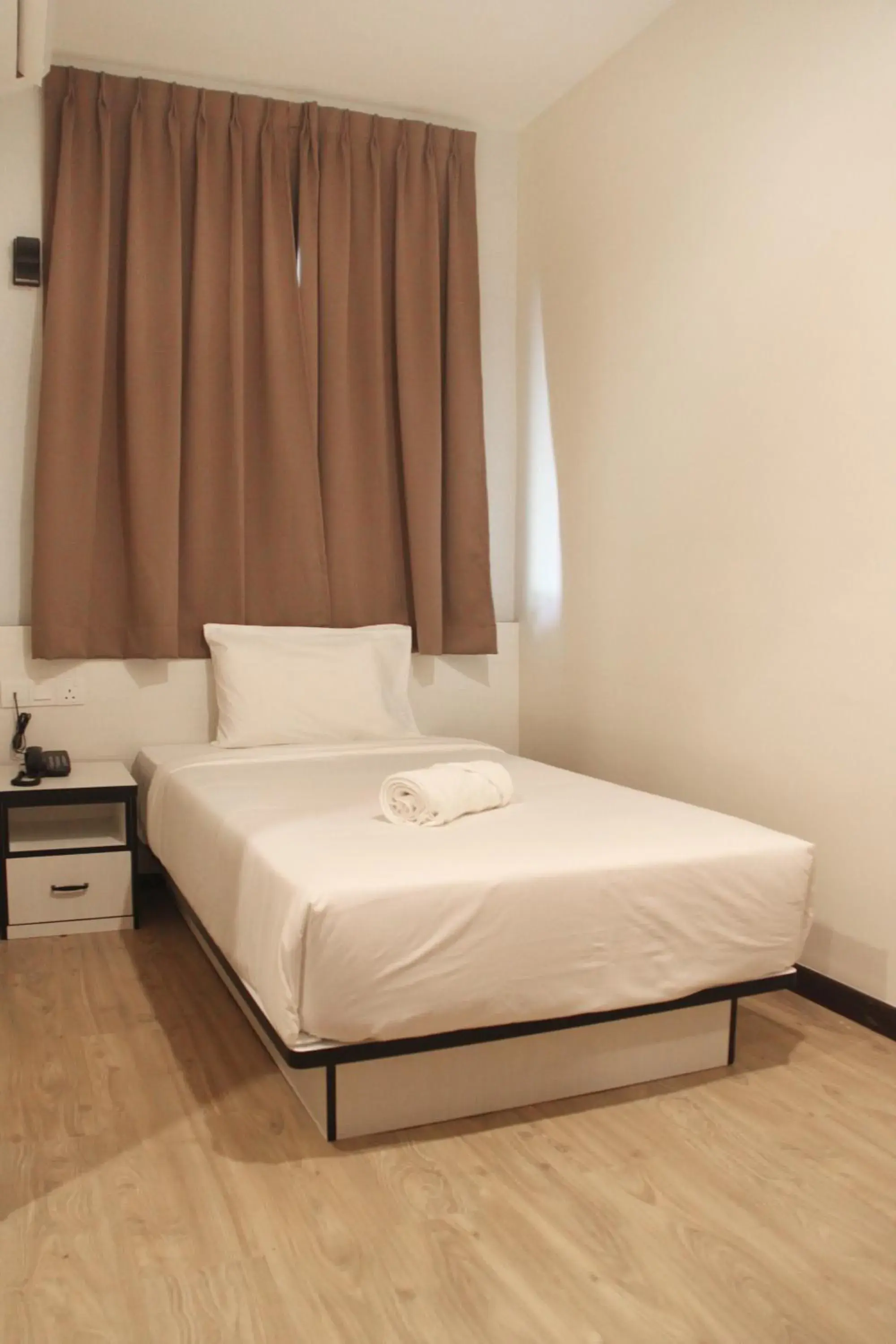 Bed in Gergasi Inn Bed in Gergasi Inn