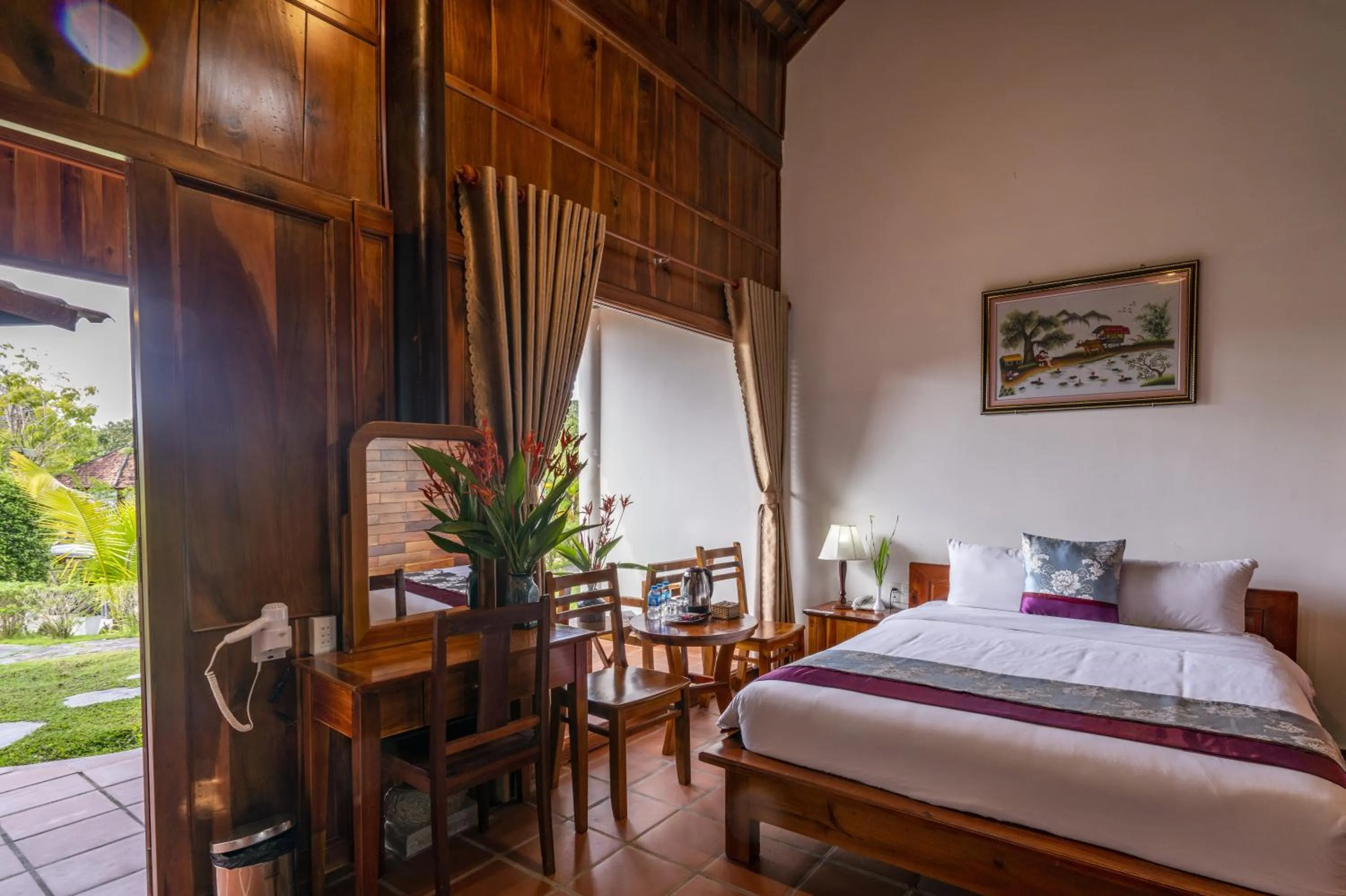 Bed in Maison Du VietNam Resort & Spa