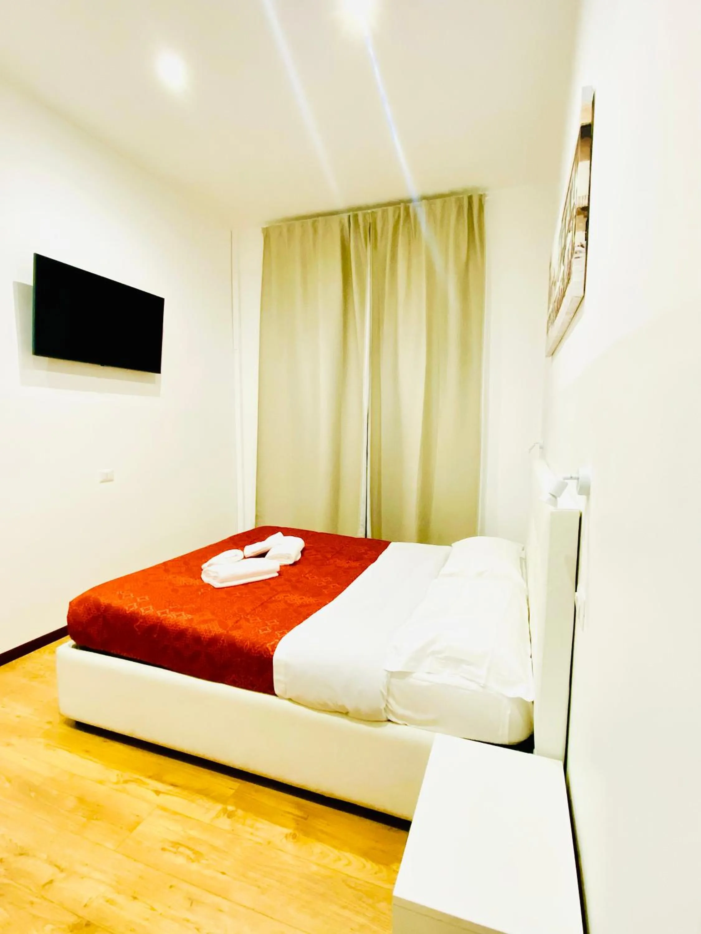 Communal lounge/ TV room, Bed in Tawhid Accomodation