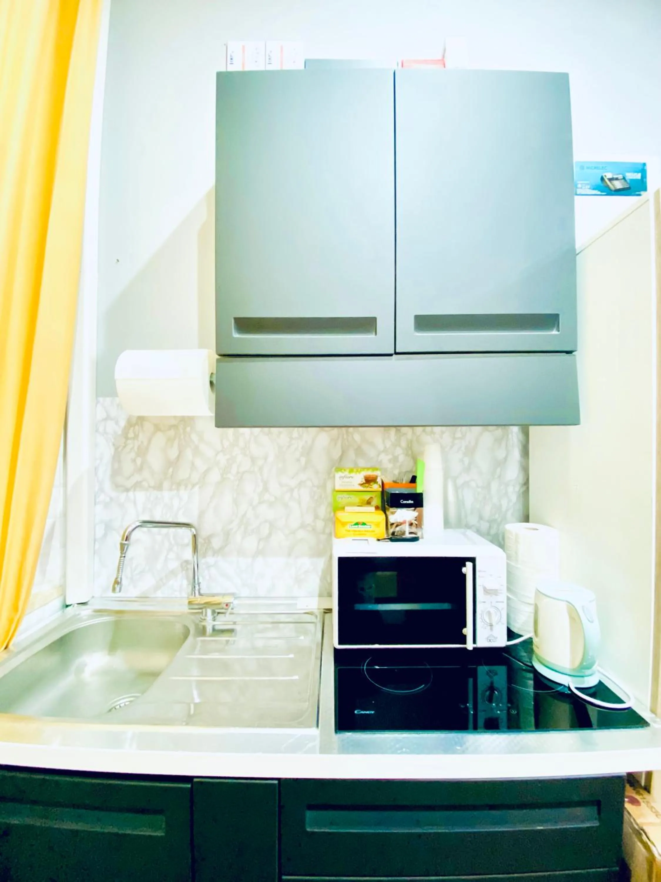 Kitchen or kitchenette in Tawhid Accomodation