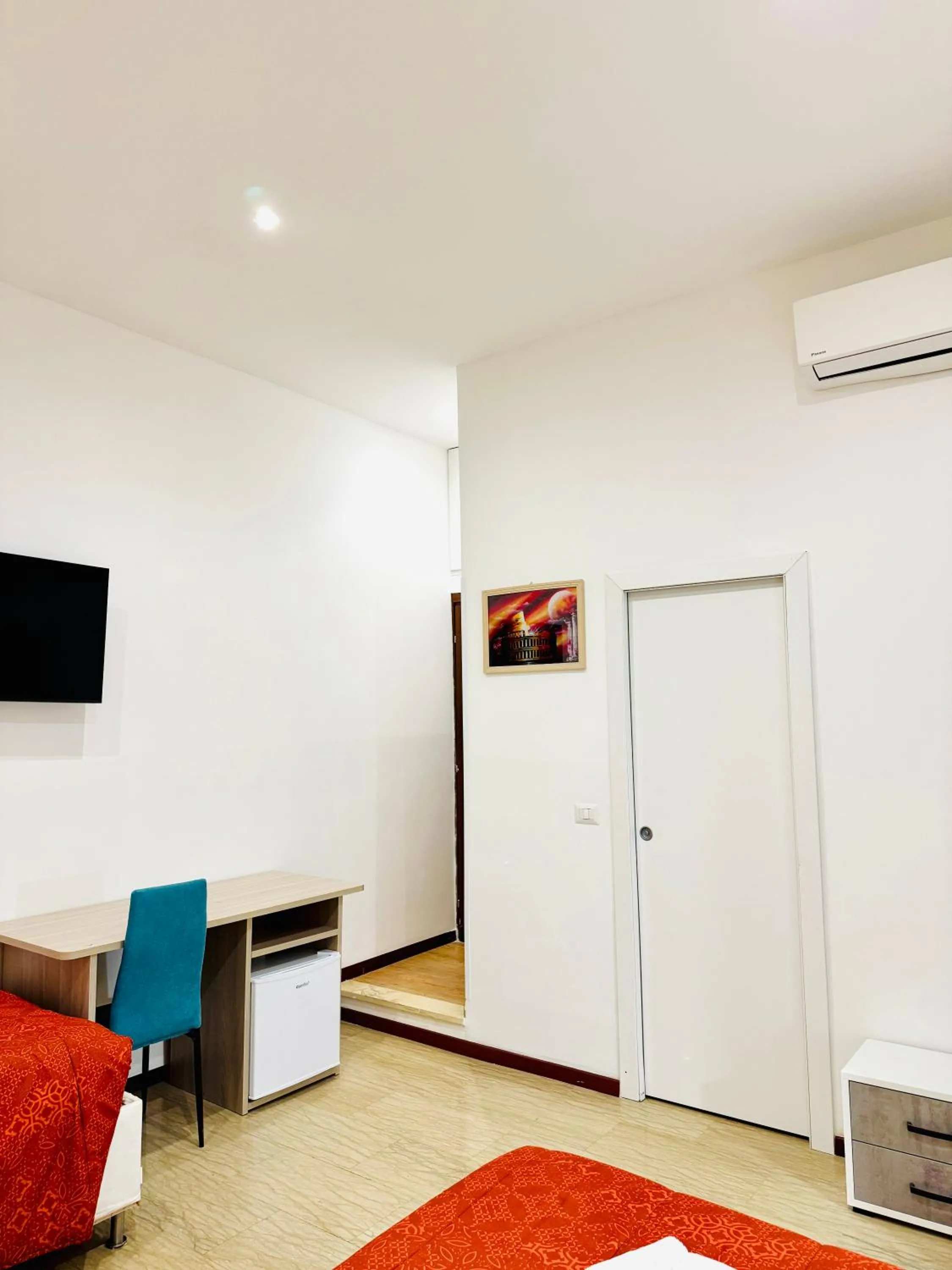 Communal lounge/ TV room, Bed in Tawhid Accomodation