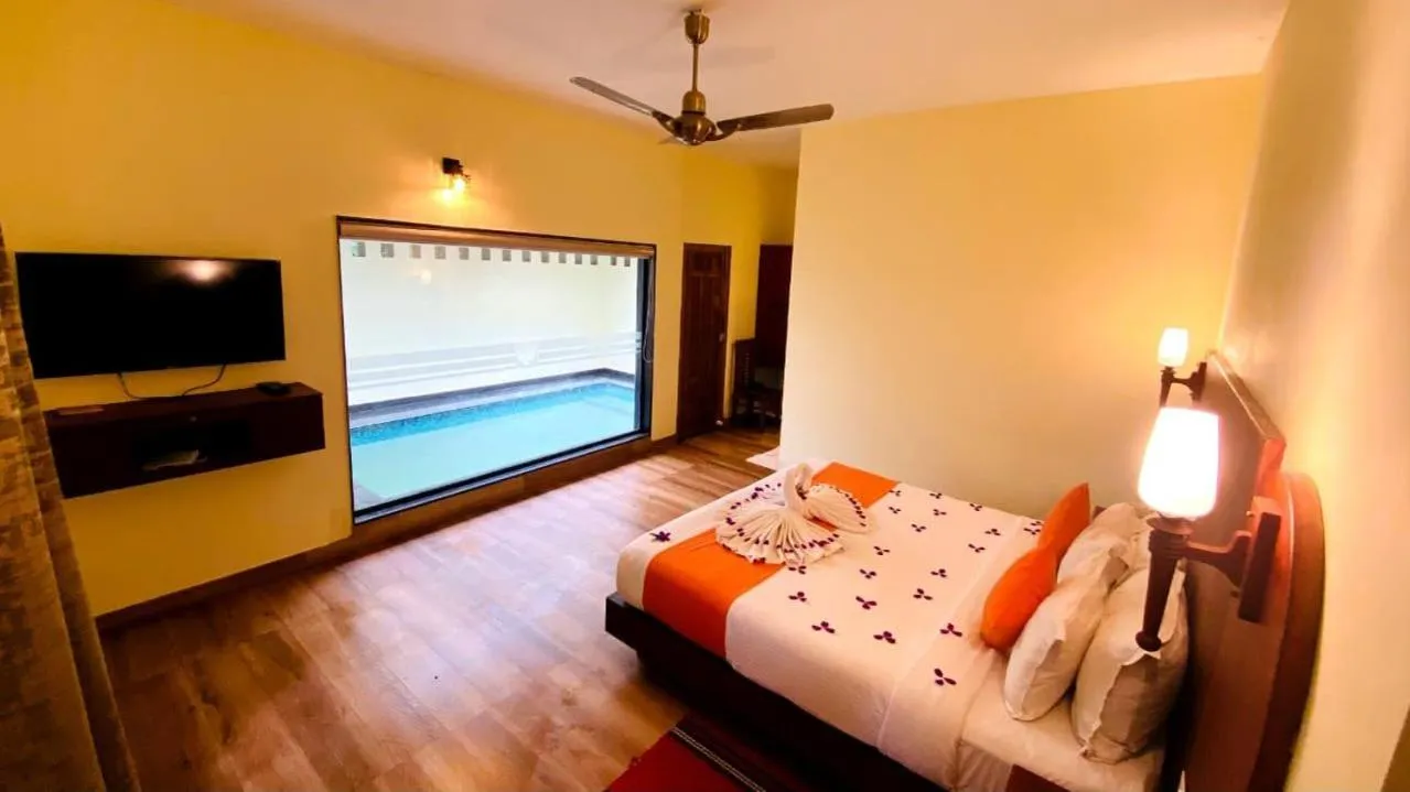 Photo of the whole room, Bed in Indeevara Luxury Resort and Spa, Wayanad
