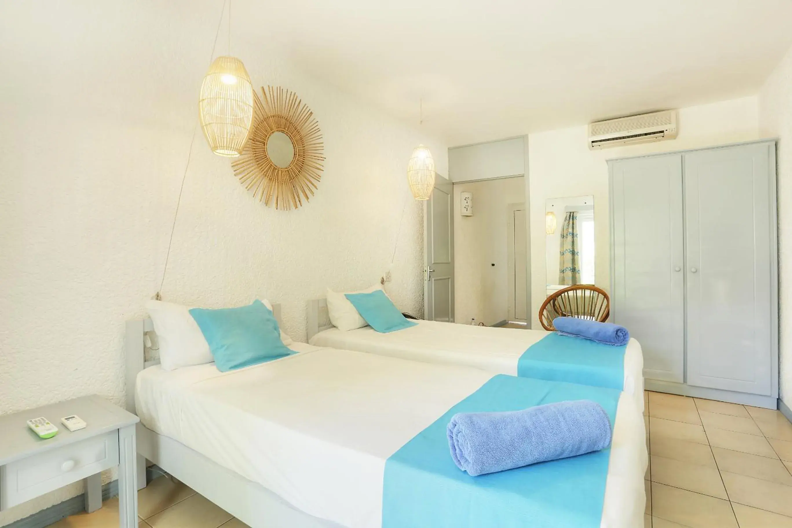 Photo of the whole room, Bed in Cocotiers Hotel – Mauritius Photo of the whole room, Bed in Cocotiers Hotel – Mauritius