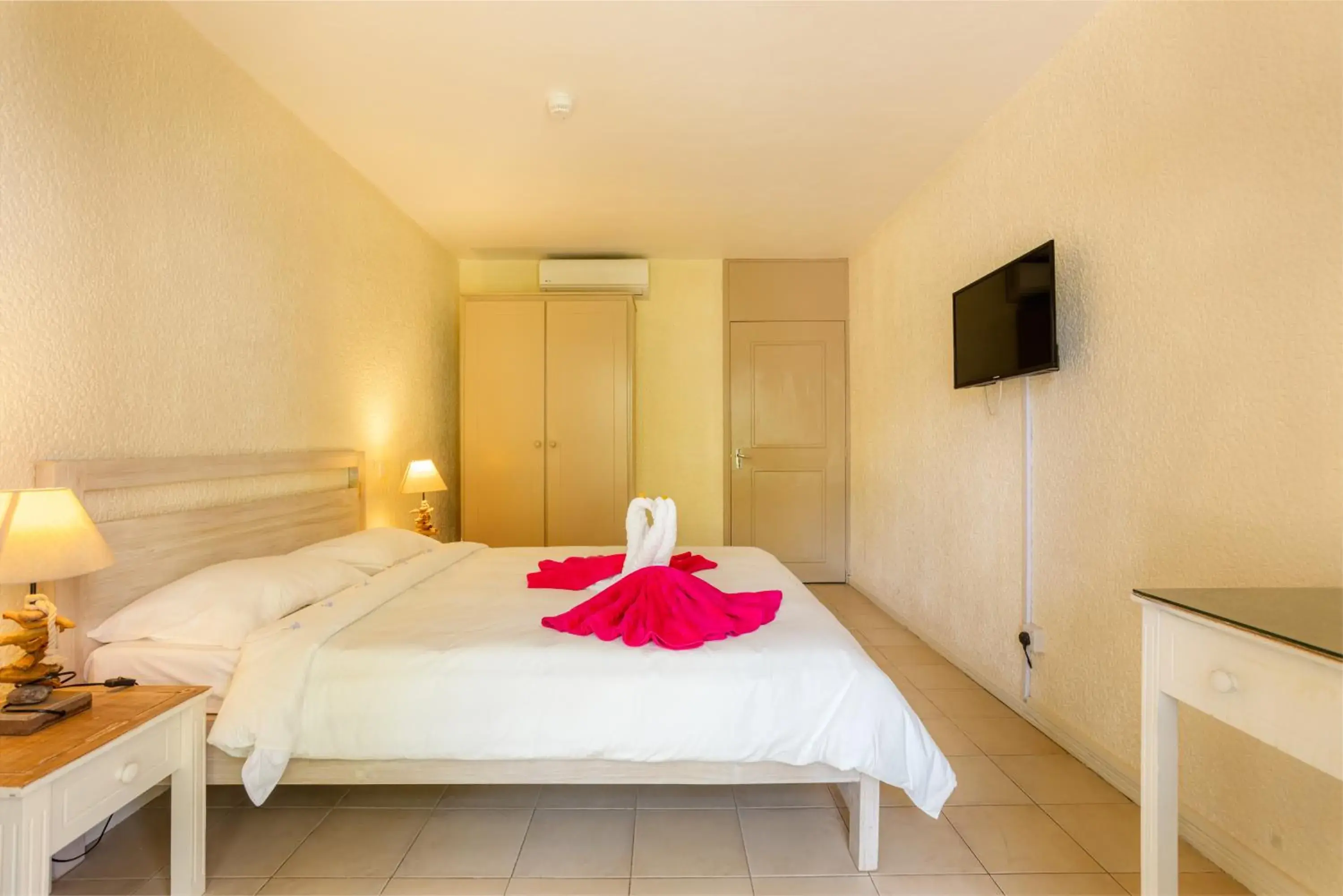 Bedroom, Bed in Cocotiers Hotel – Mauritius Bedroom, Bed in Cocotiers Hotel – Mauritius