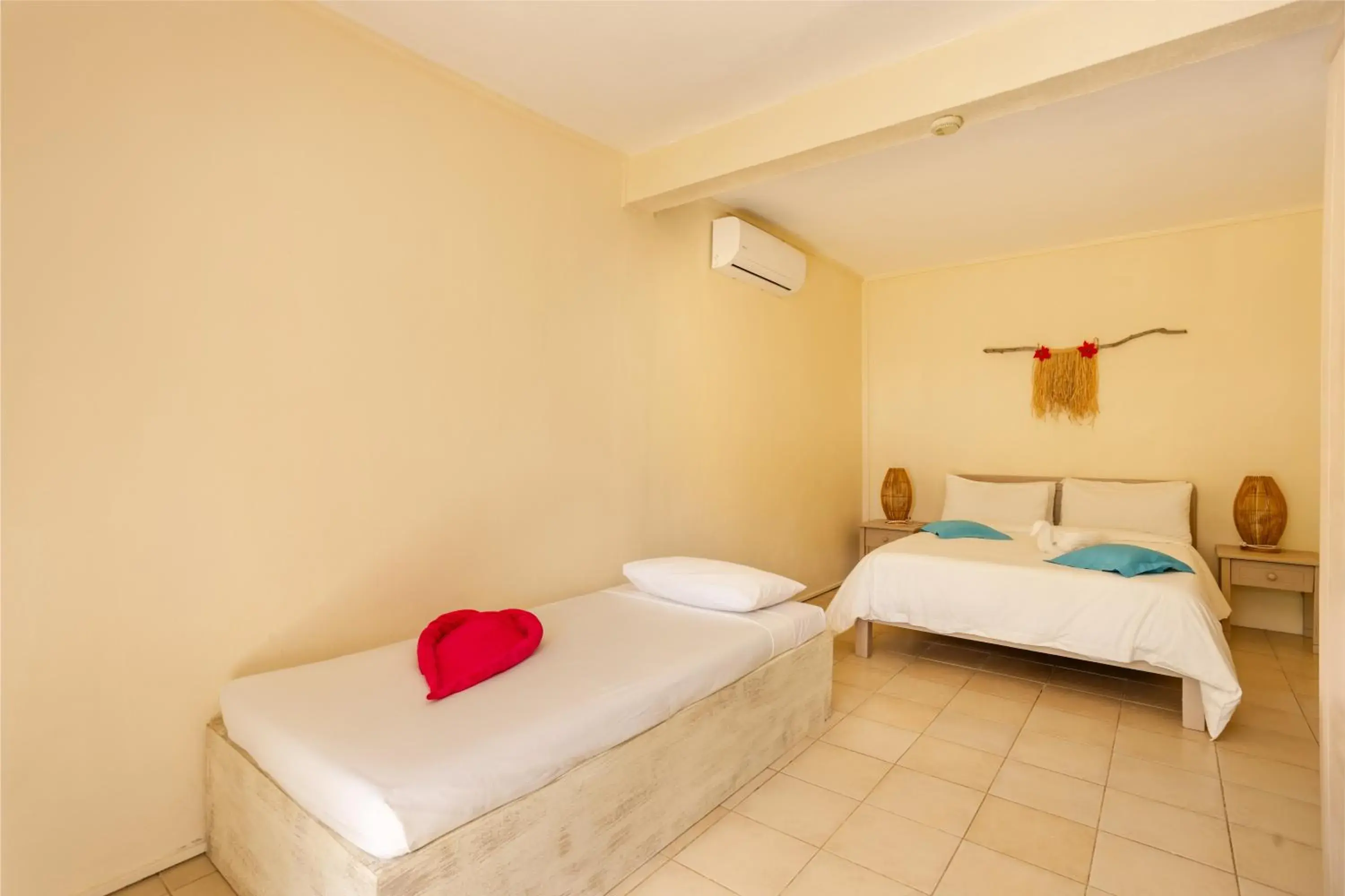 Bedroom, Bed in Cocotiers Hotel – Mauritius Bedroom, Bed in Cocotiers Hotel – Mauritius