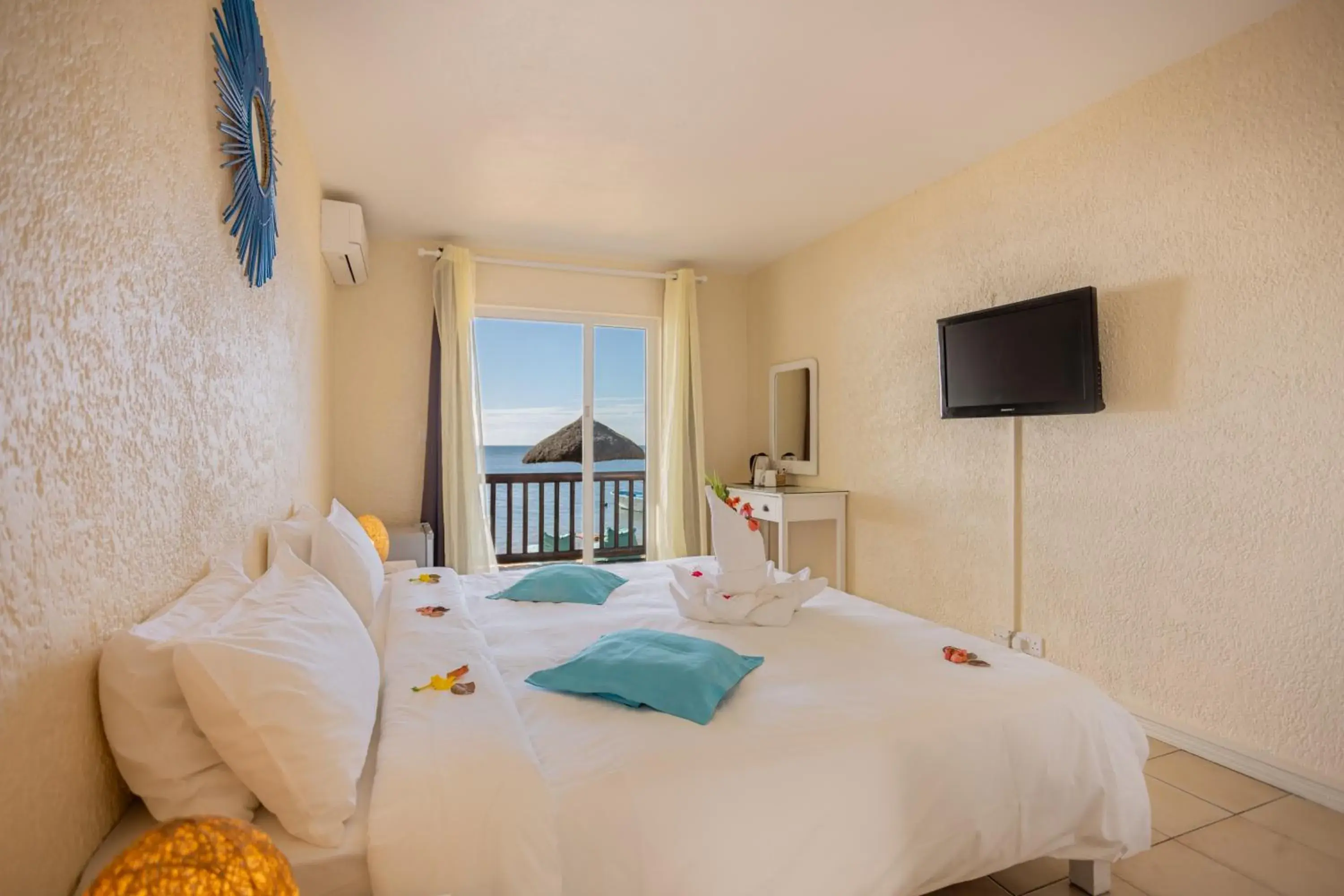 Bedroom, Bed in Cocotiers Hotel – Mauritius Bedroom, Bed in Cocotiers Hotel – Mauritius