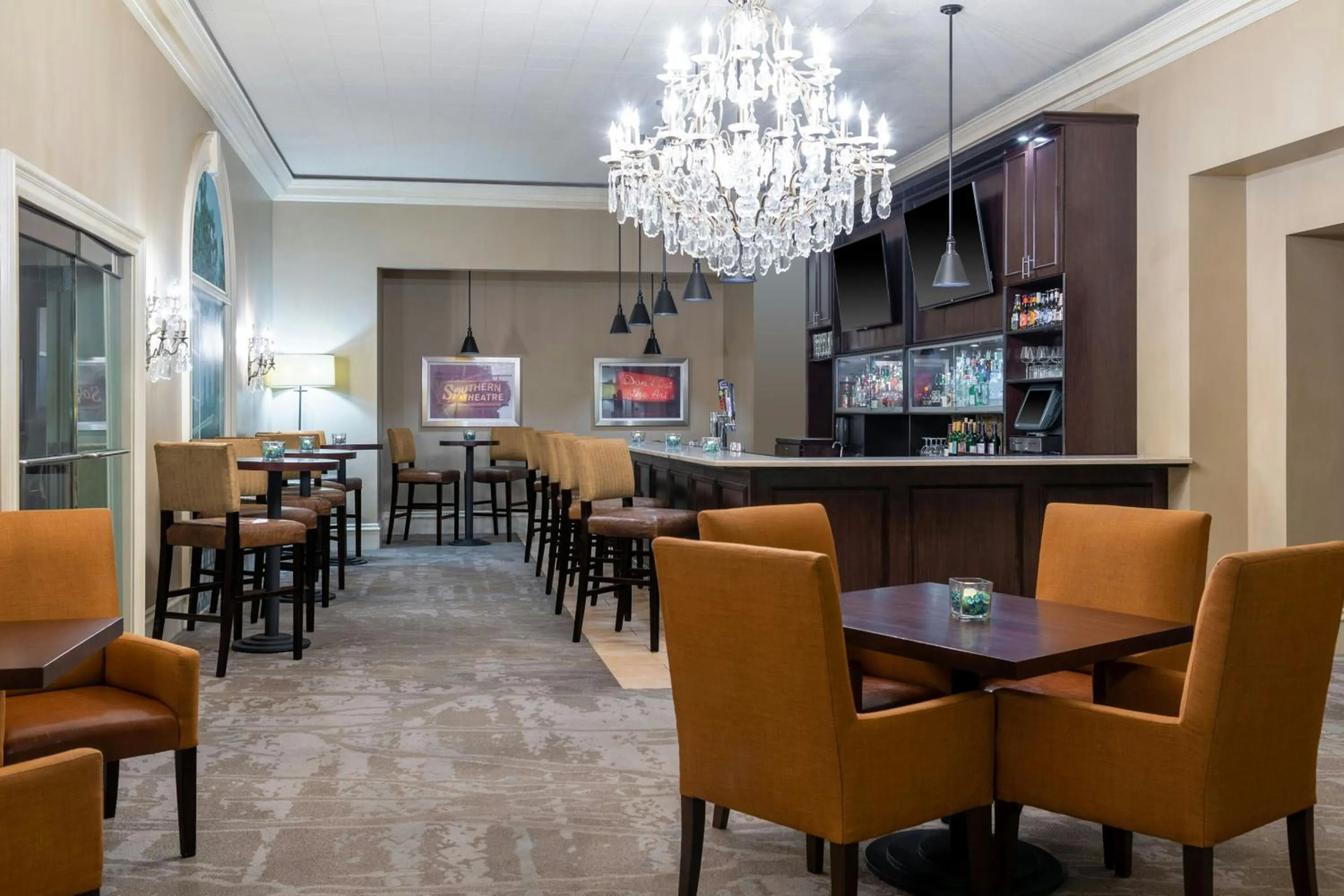 Lounge or bar in The Capital Suites Hotel