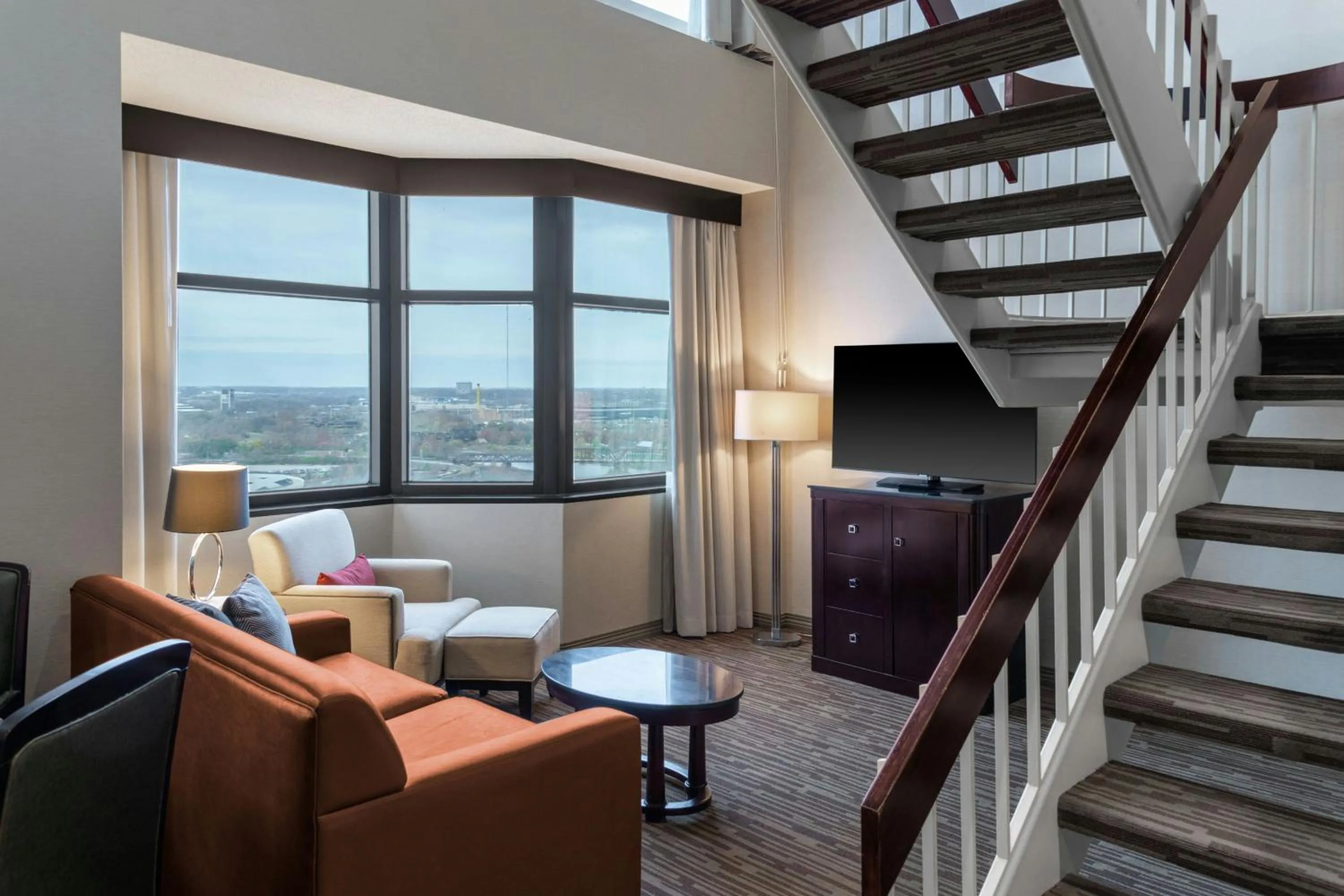 Living room in The Capital Suites Hotel