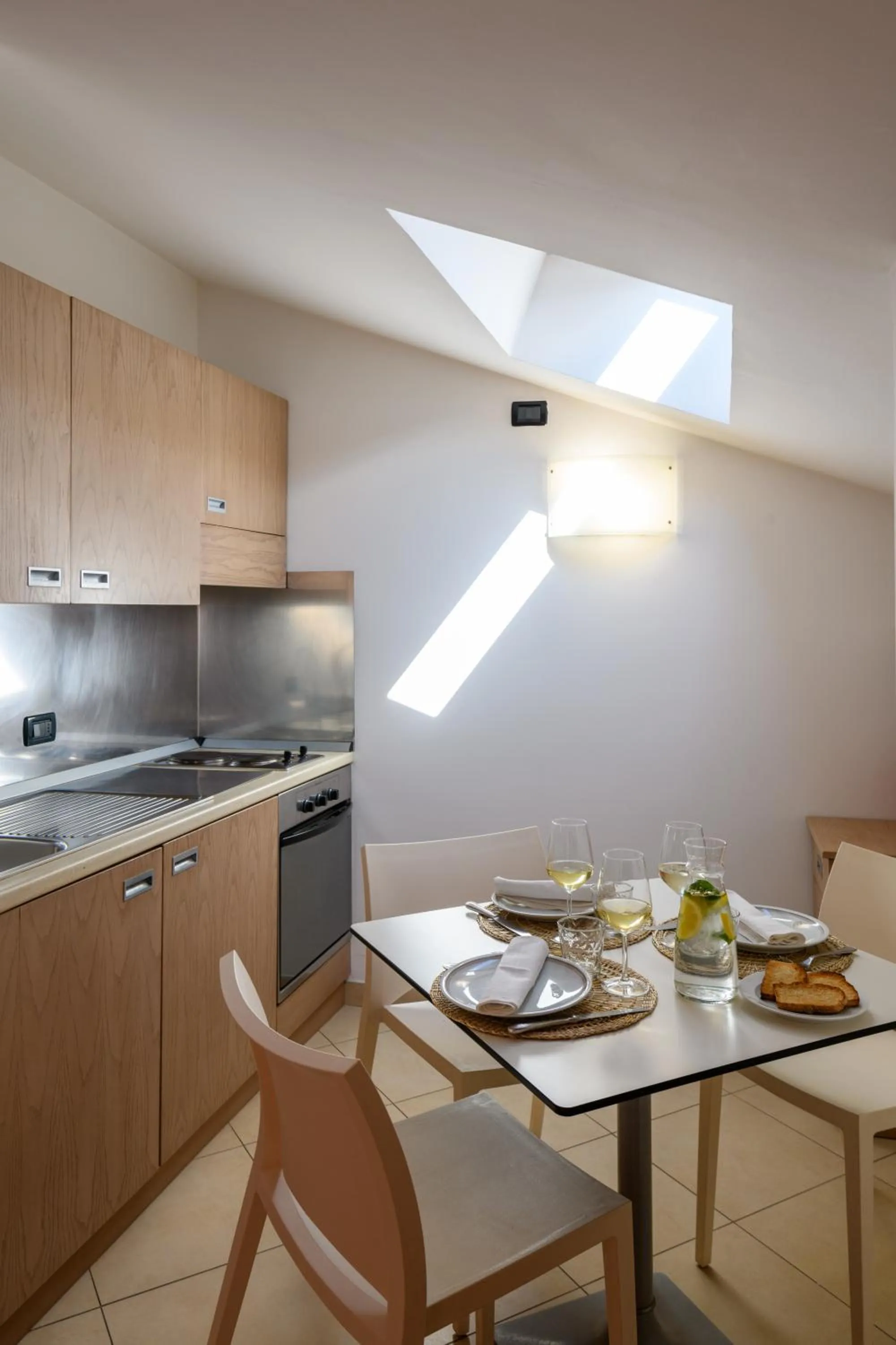 Kitchen or kitchenette in Hotel & Apartments Sasso