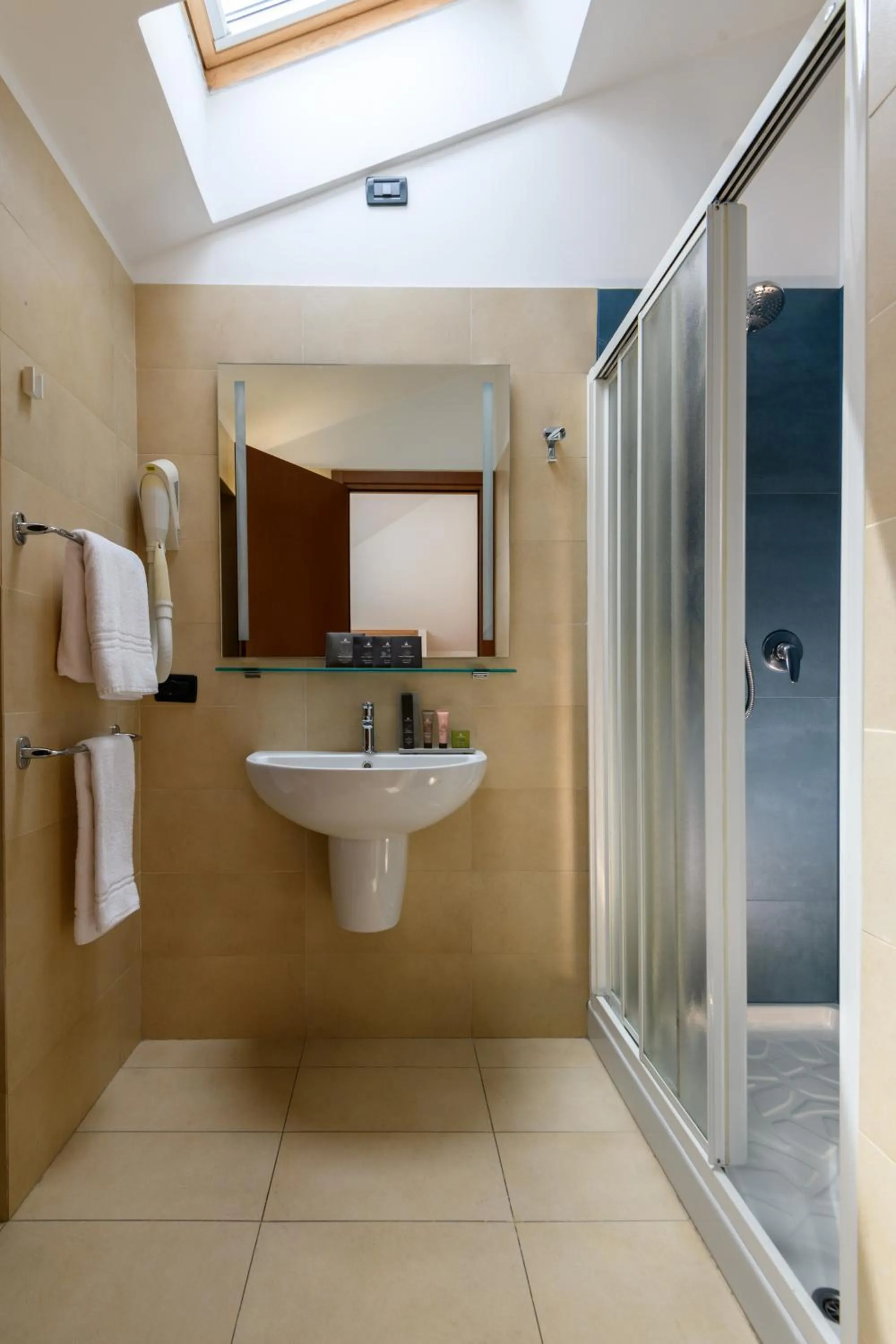 Bathroom in Hotel & Apartments Sasso