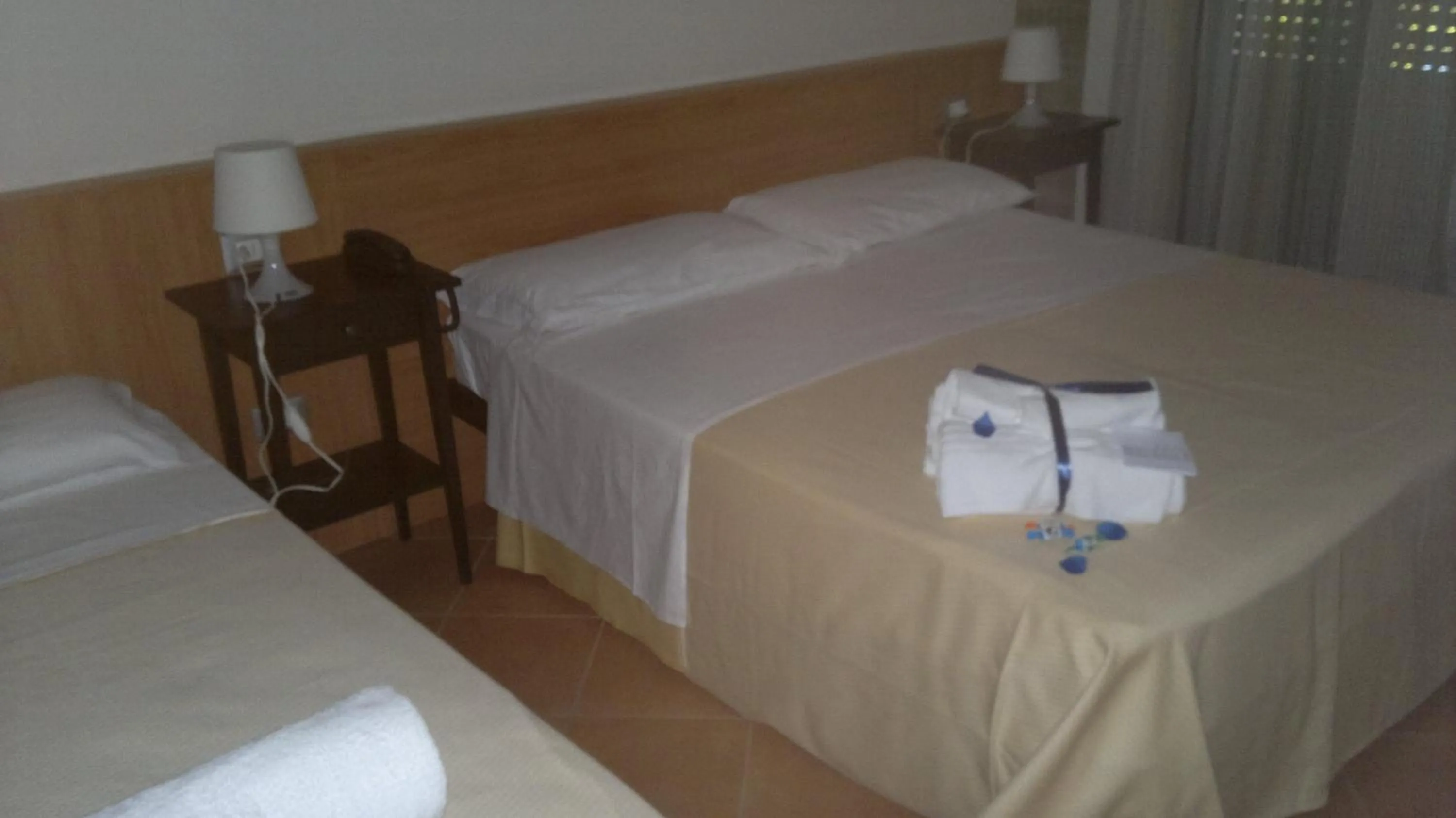 Bedroom in Hotel Leuco'