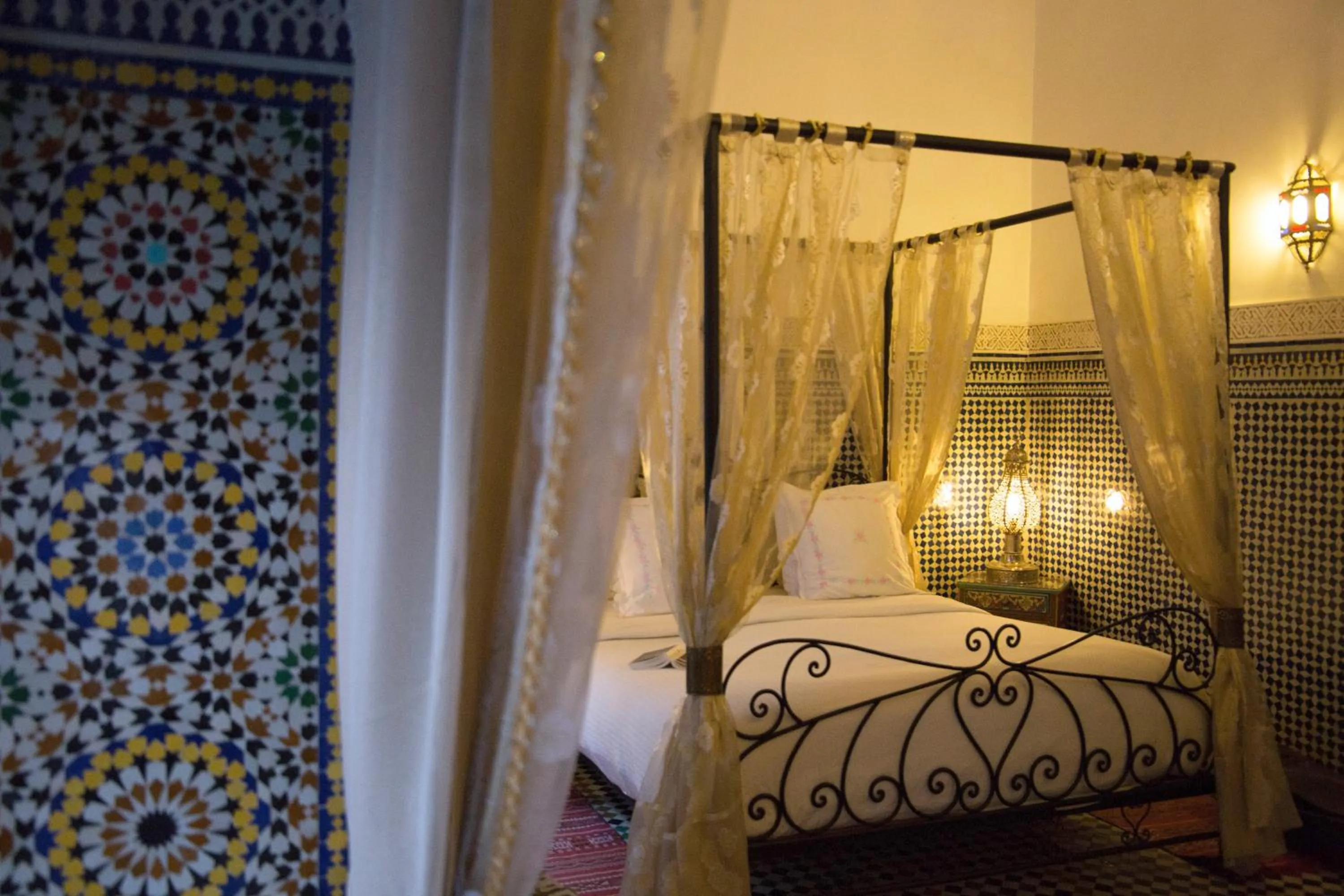 Bed in Riad Fes Kettani