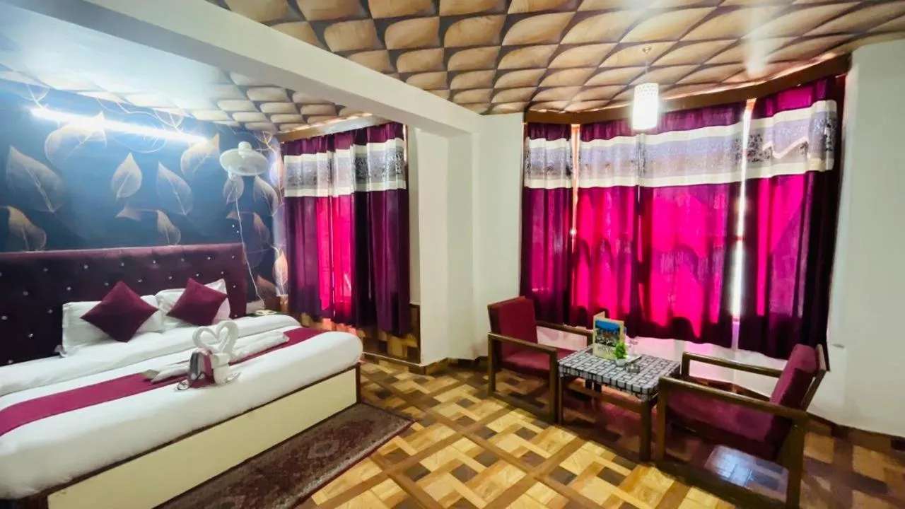 Bed in Hotel Hilltop At Mall Road Manali With Open Terrace