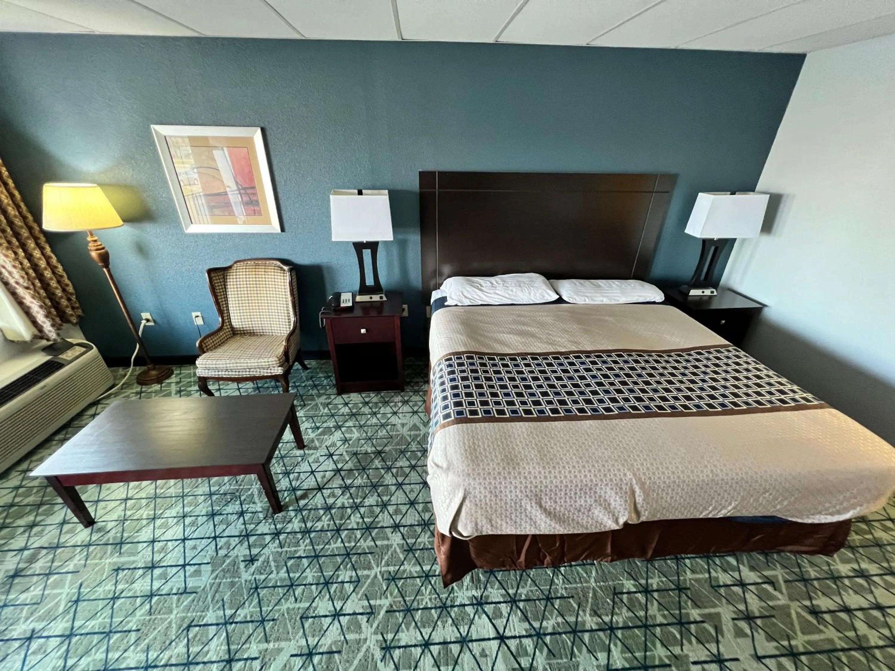 Bed in Executive Inn Texarkana