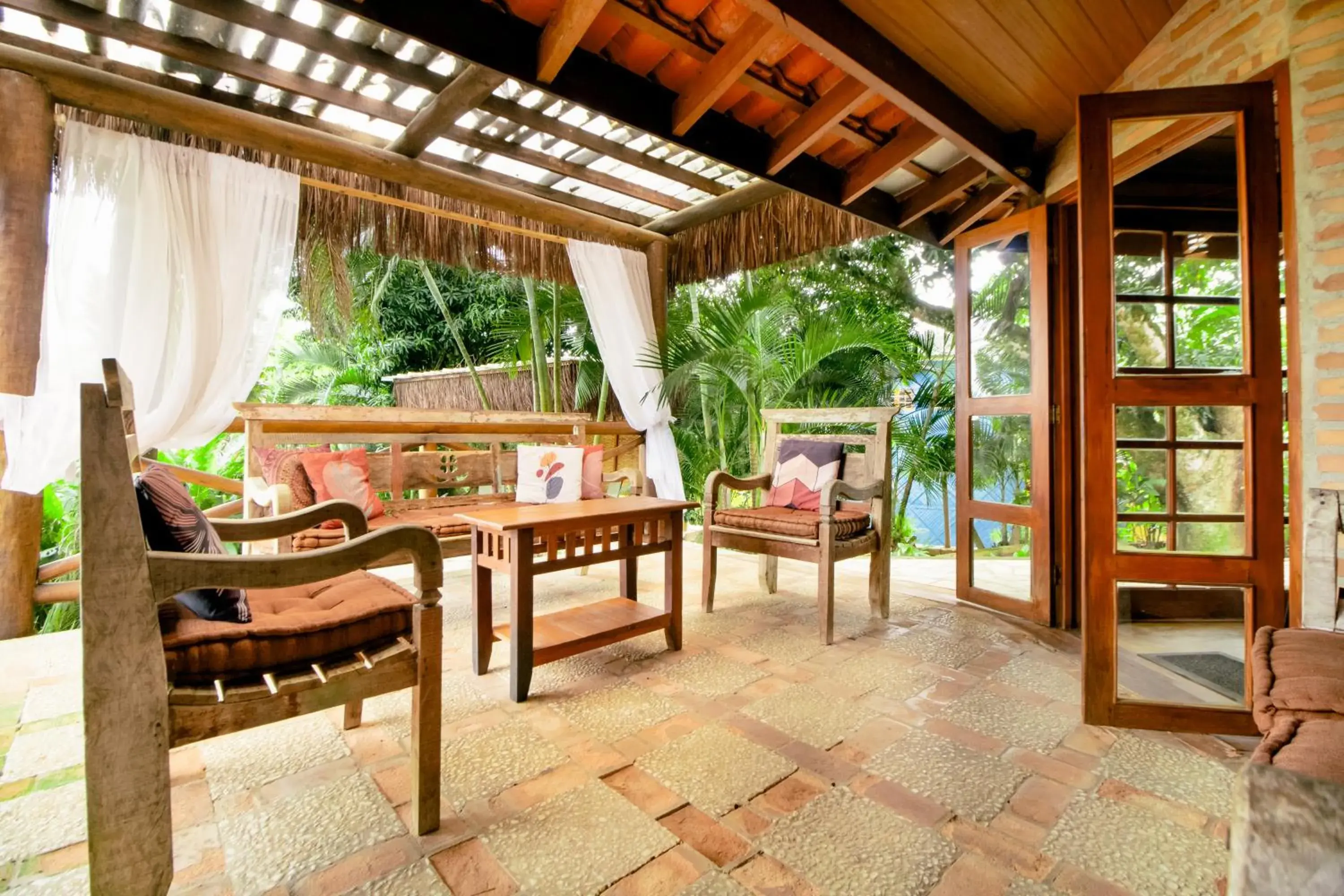 Living room in VELINN Pousada Catamarã Brasil Living room in VELINN Pousada Catamarã Brasil