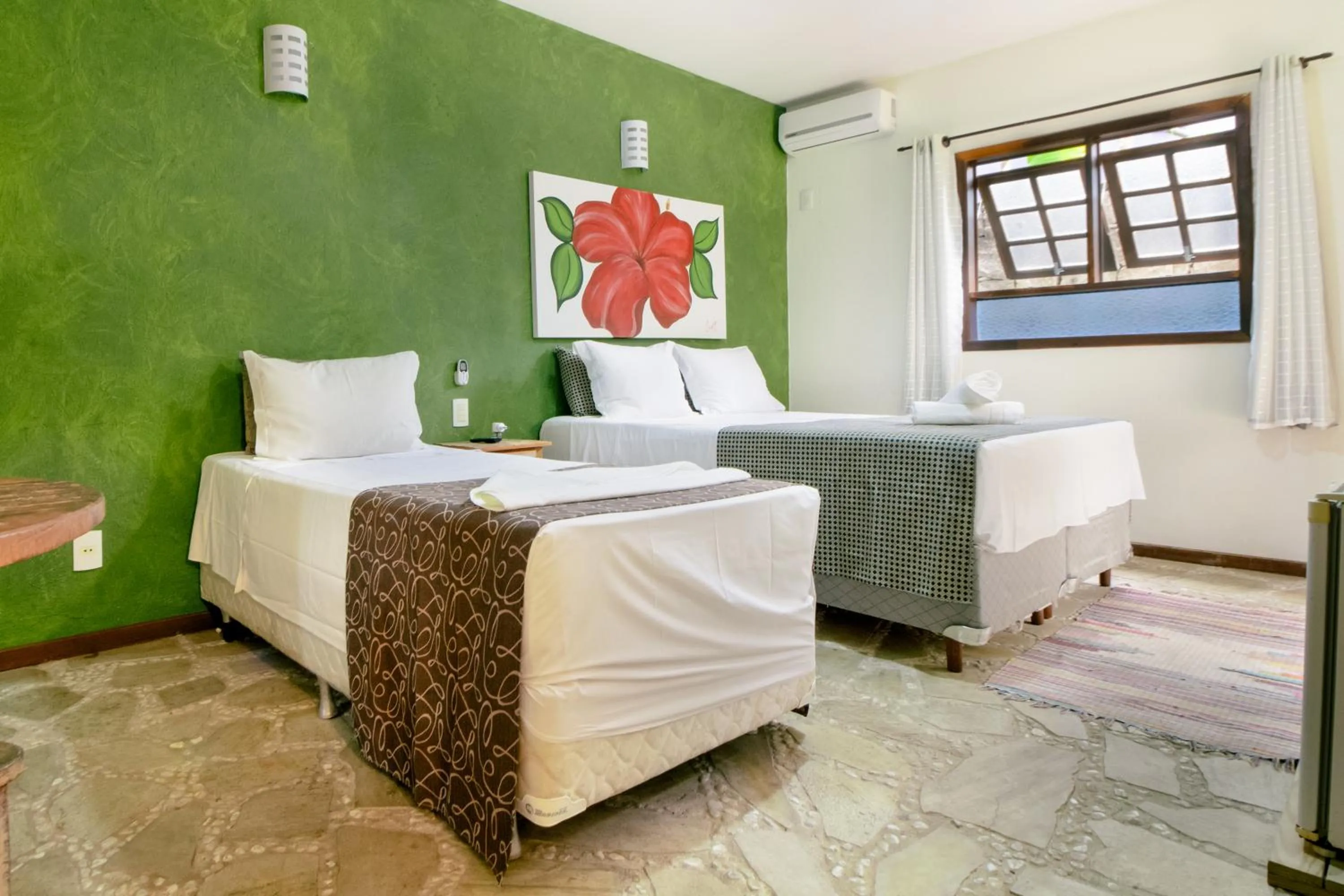 Bed in VELINN Pousada Catamarã Brasil