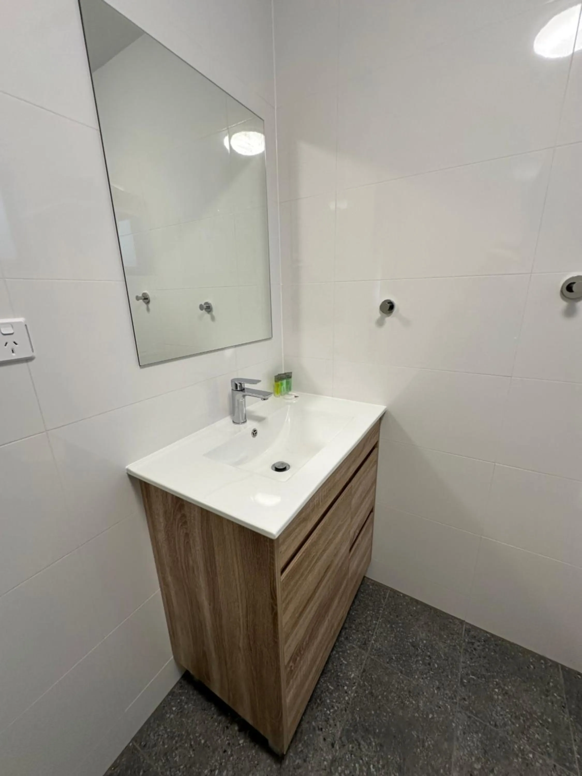 Bathroom in Travellers Motor Village