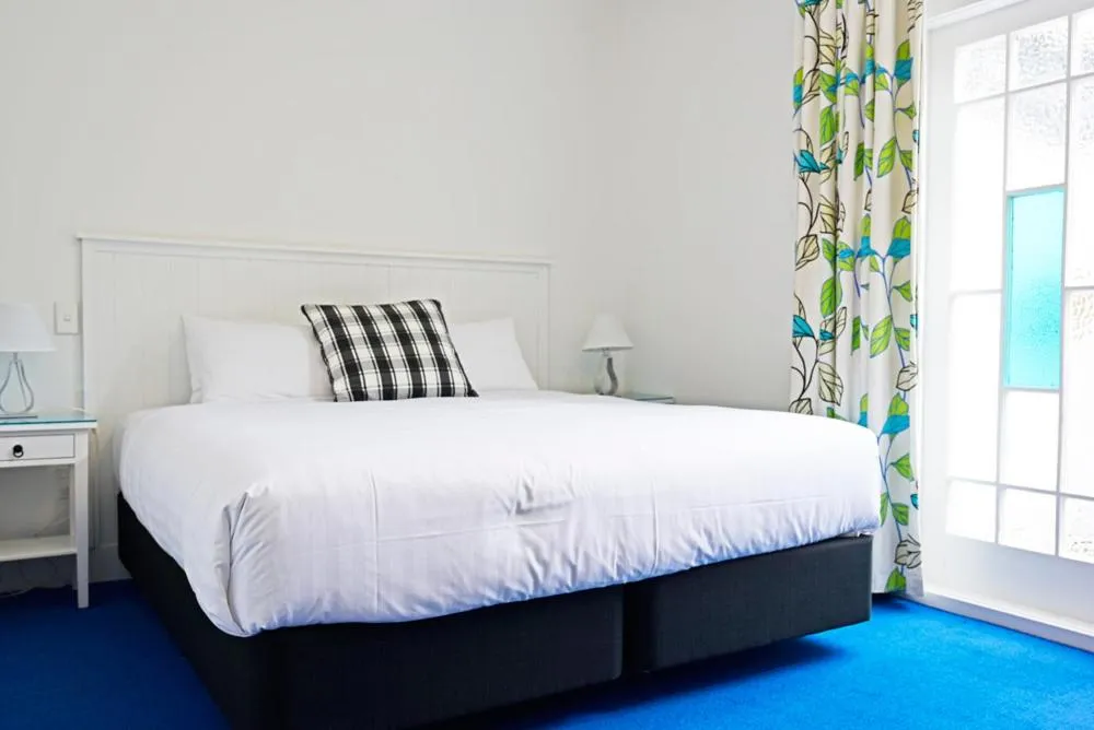 Bed in The Old Oak Boutique Hotel