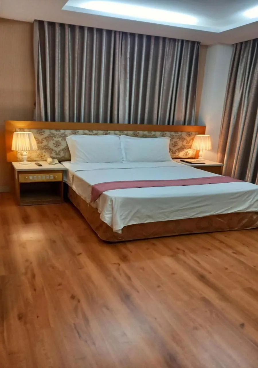 Bed in Khai Hoan Apartment Hotel