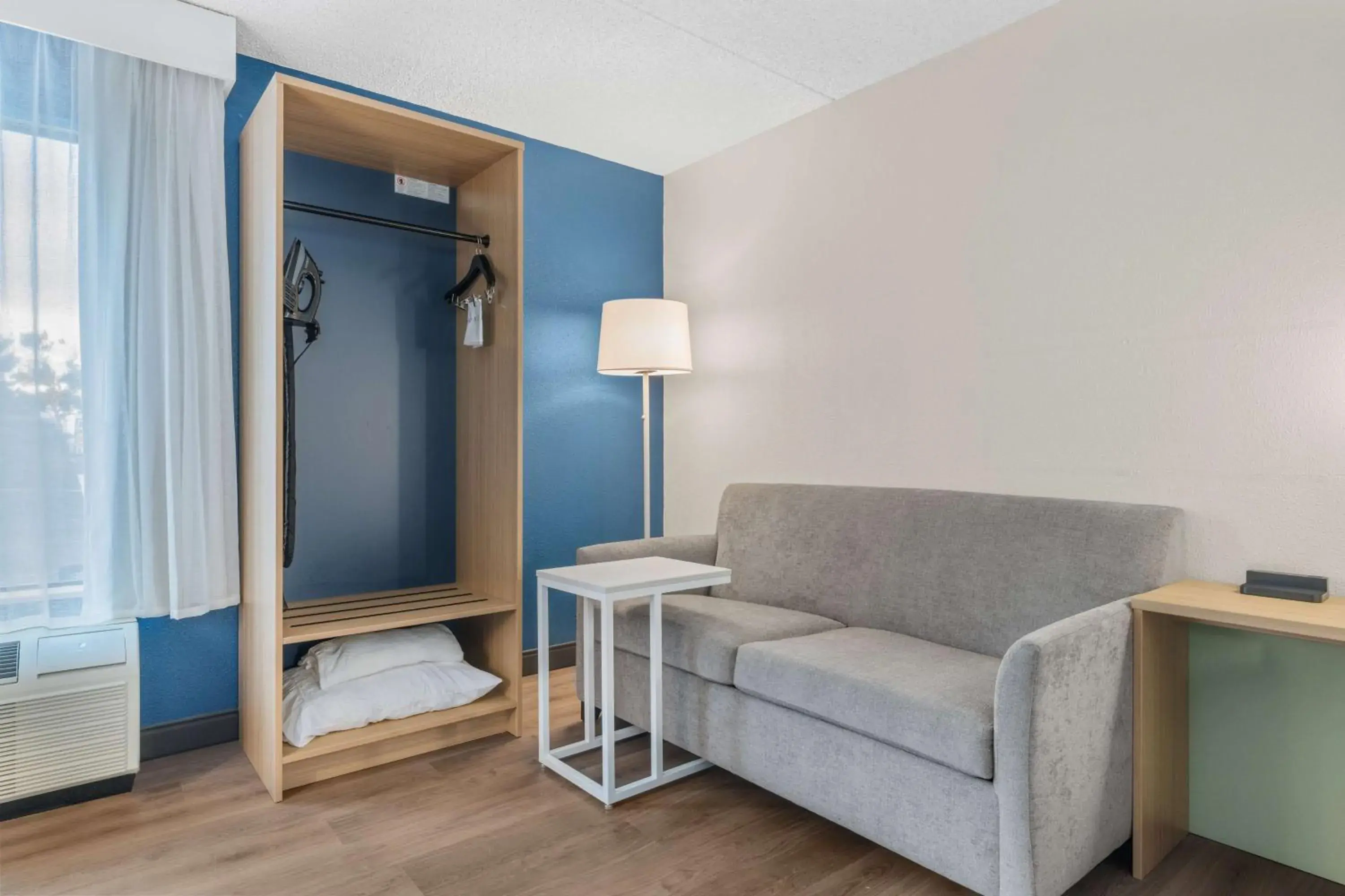 Living room, Bed in Spark by Hilton Colorado Springs I 25 Central Living room, Bed in Spark by Hilton Colorado Springs I 25 Central