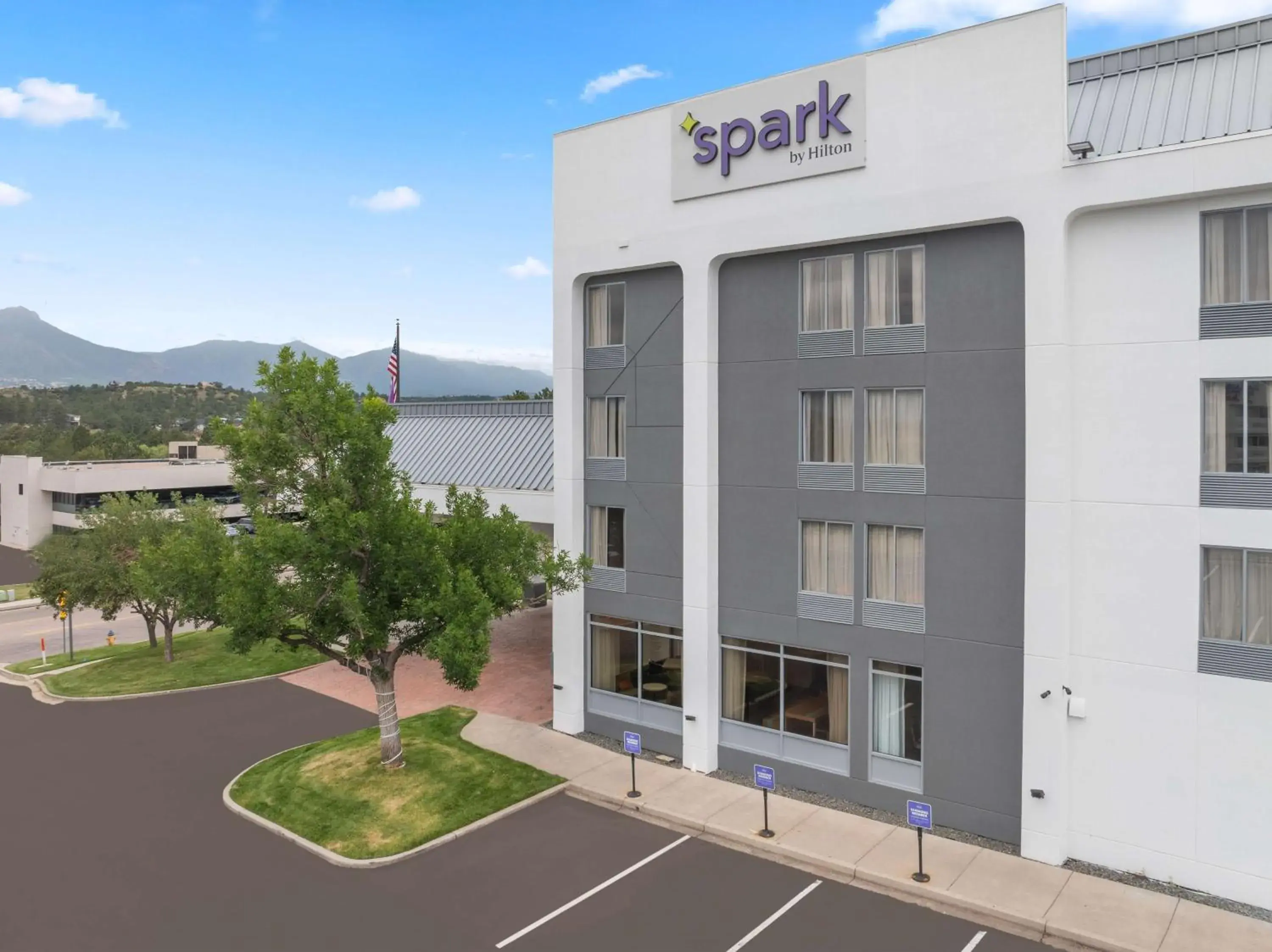 Property building in Spark by Hilton Colorado Springs I 25 Central Property building in Spark by Hilton Colorado Springs I 25 Central