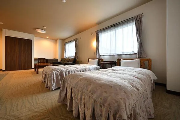 Bed in Hotel Takimoto