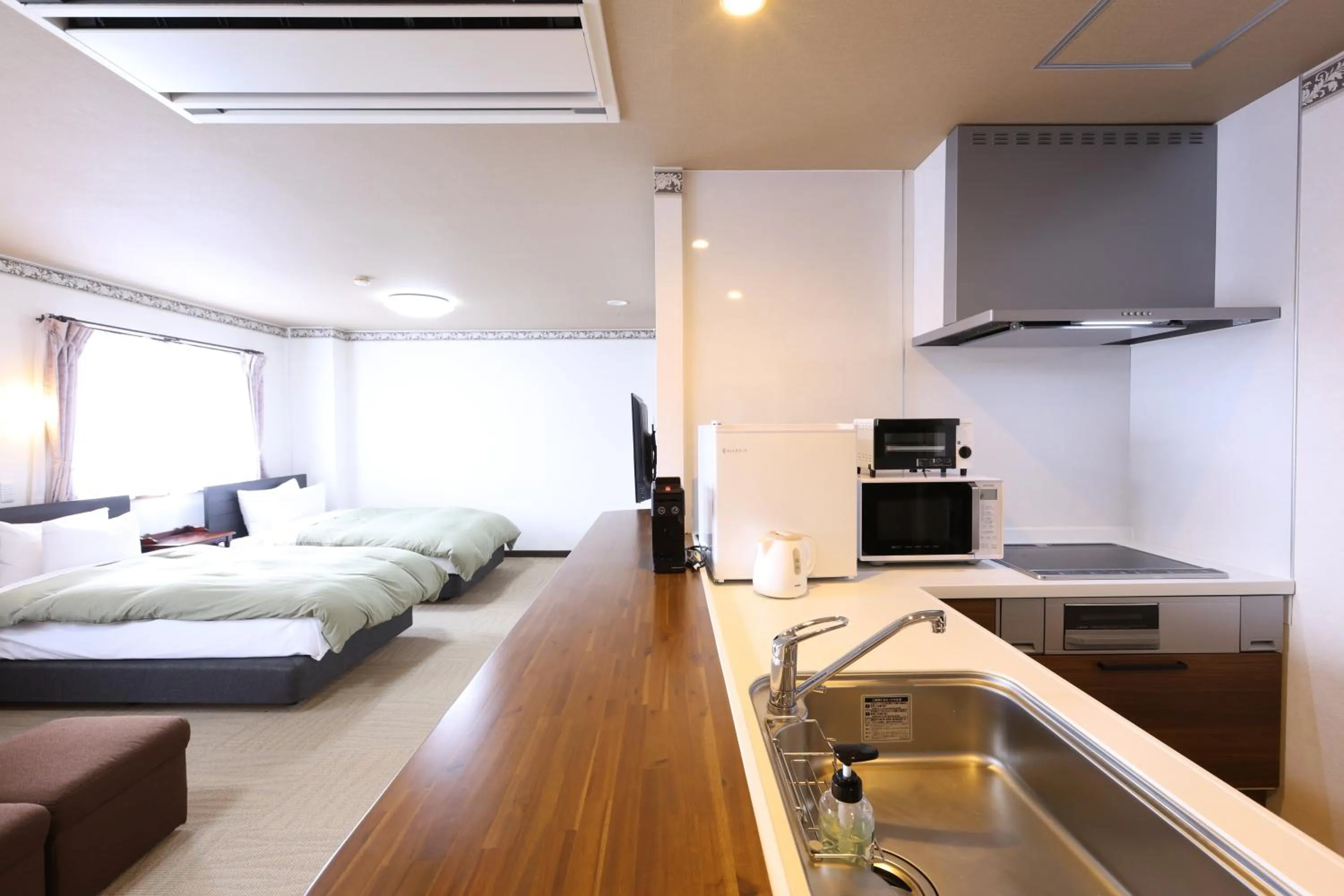 Bed in Hotel Takimoto