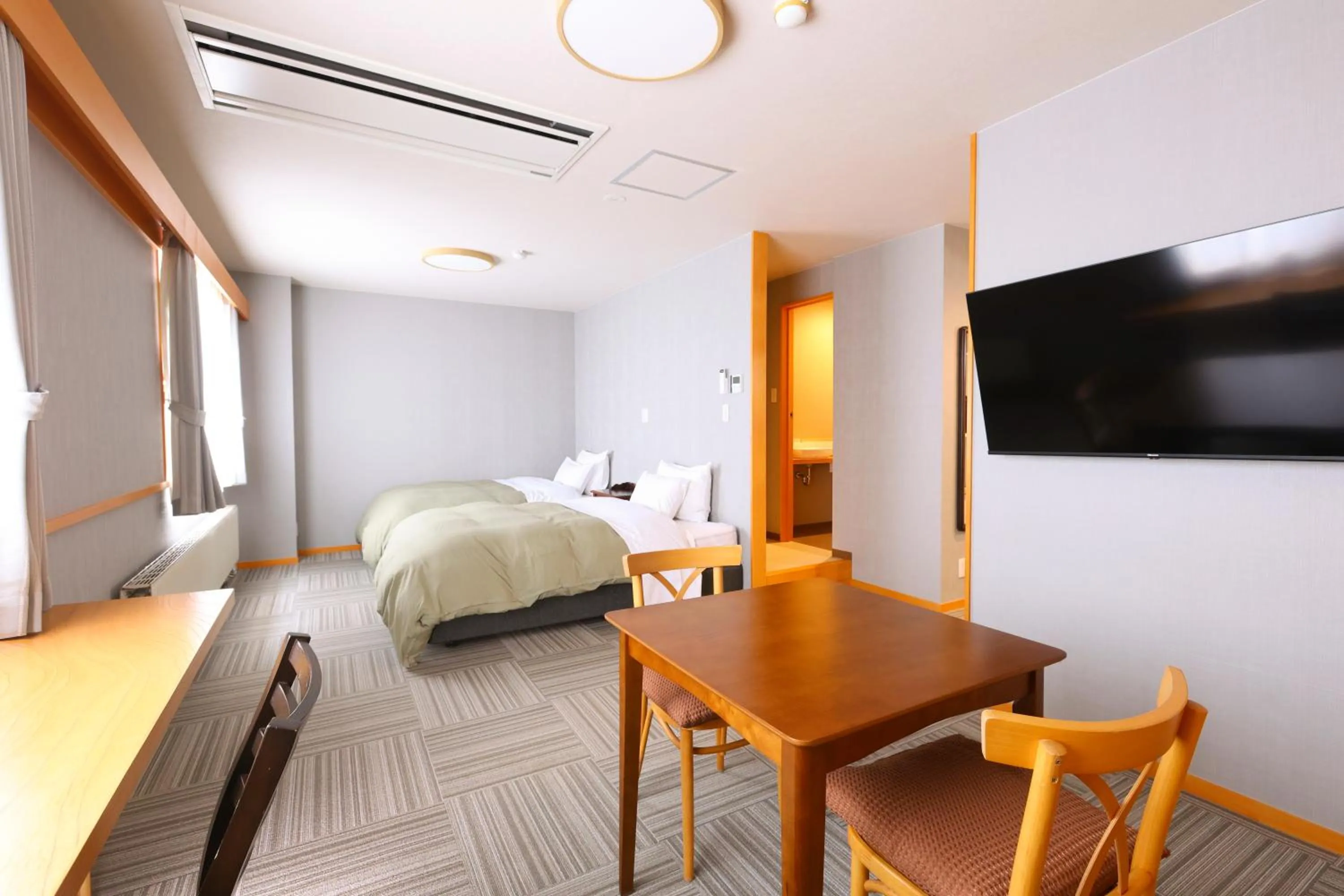 Bed in Hotel Takimoto