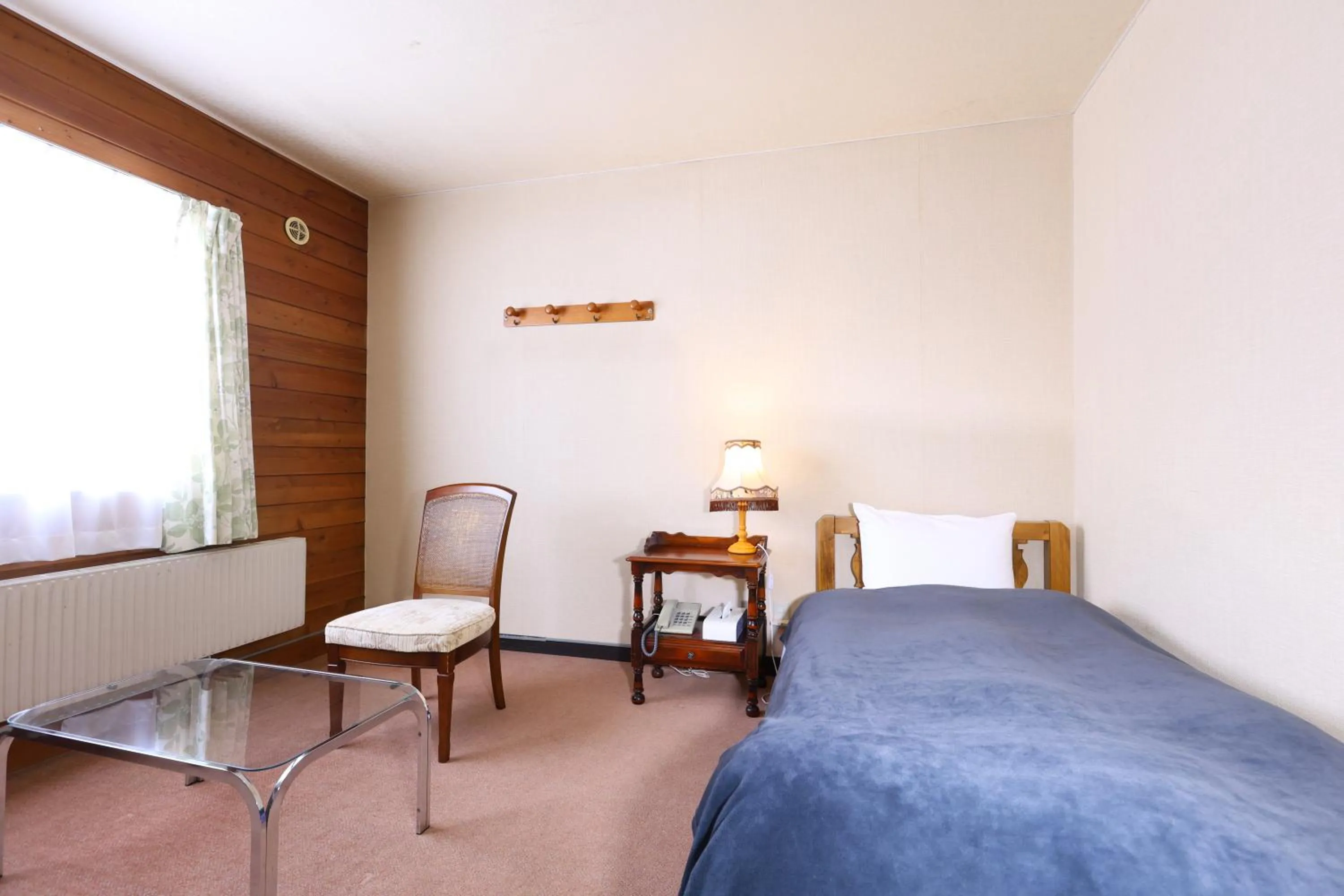 Bed in Hotel Takimoto