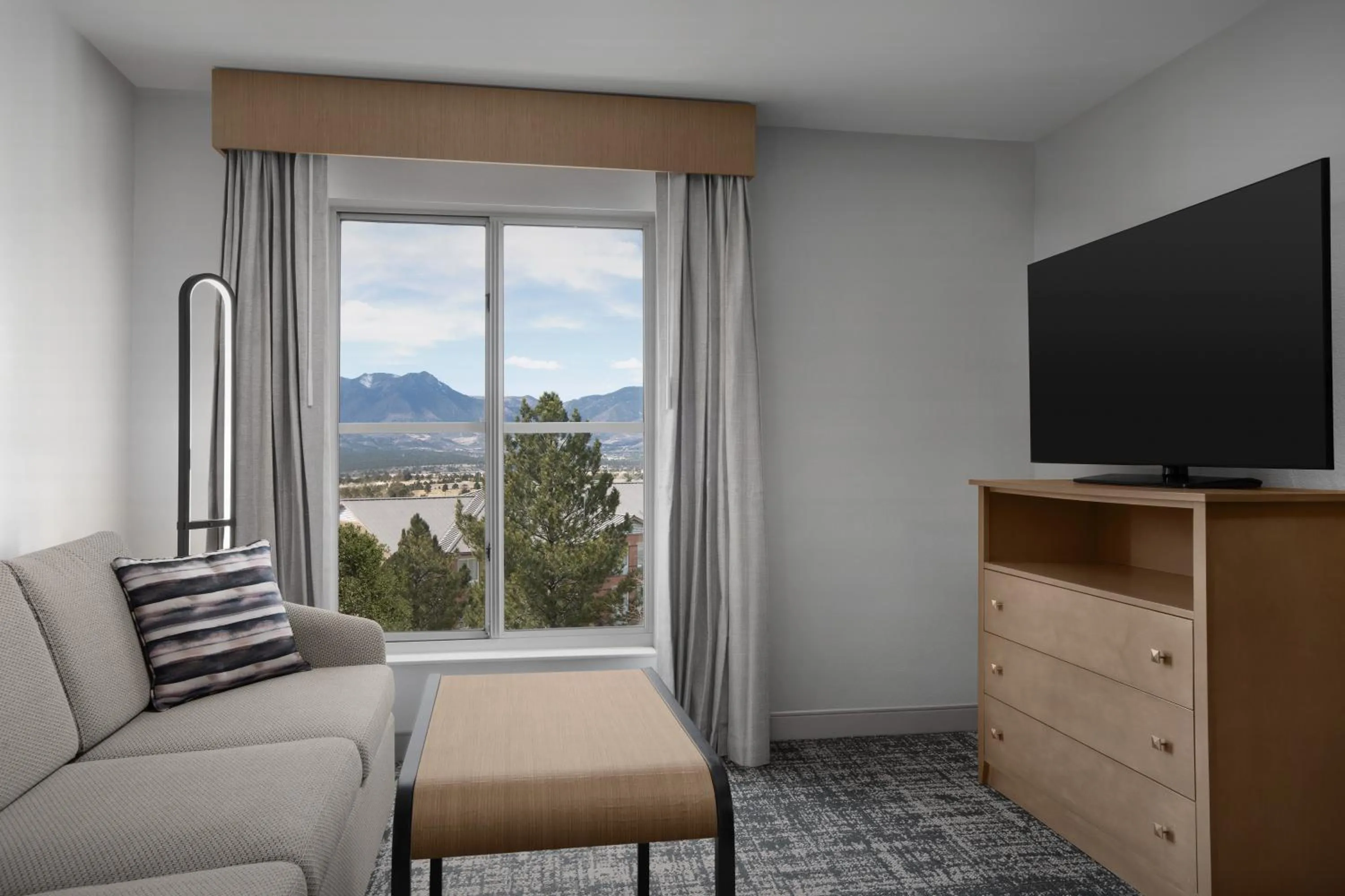 Communal lounge/ TV room in Homewood Suites by Hilton Colorado Springs-North