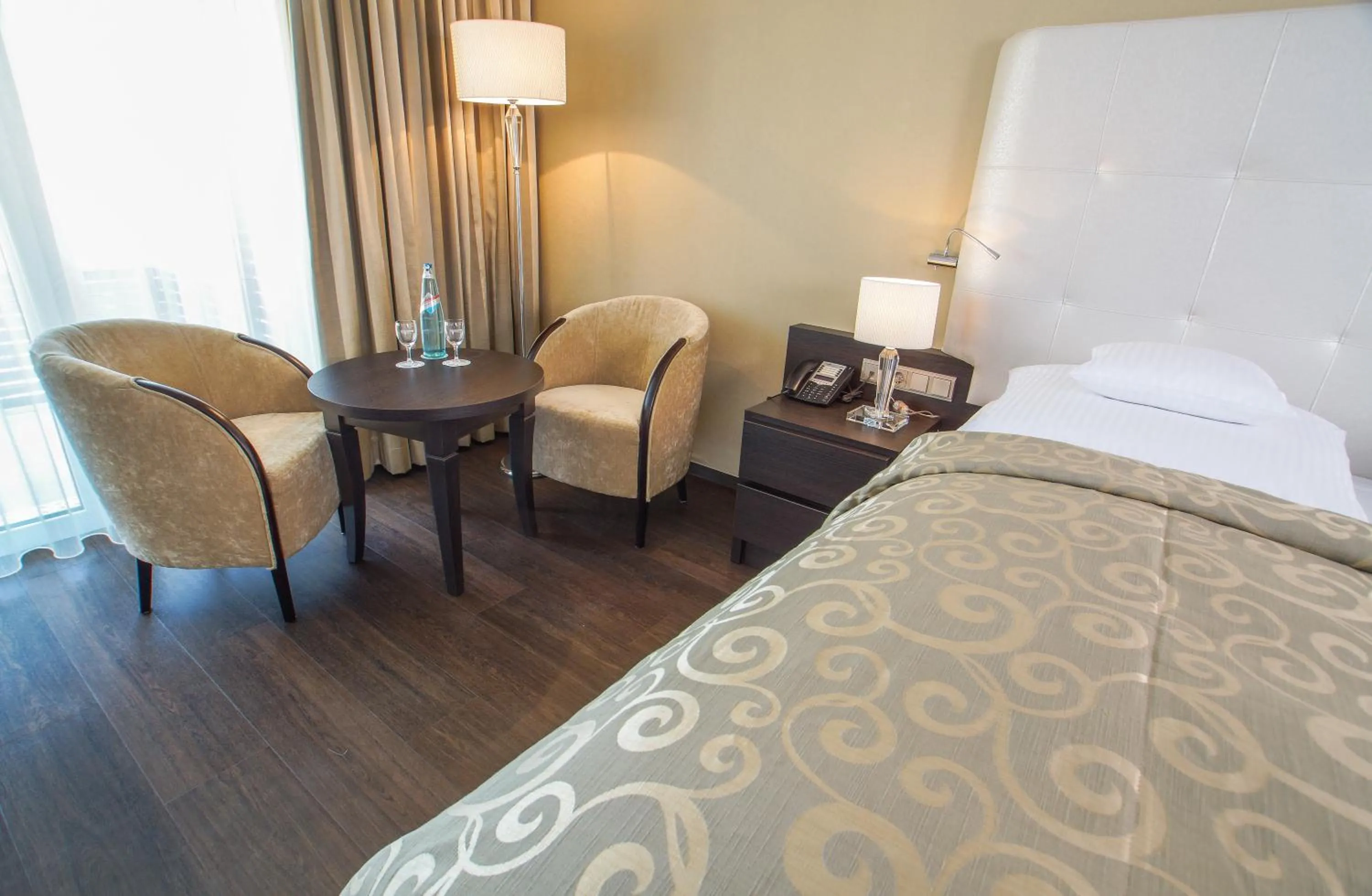 Seating area, Bed in Hotel Winzerstube