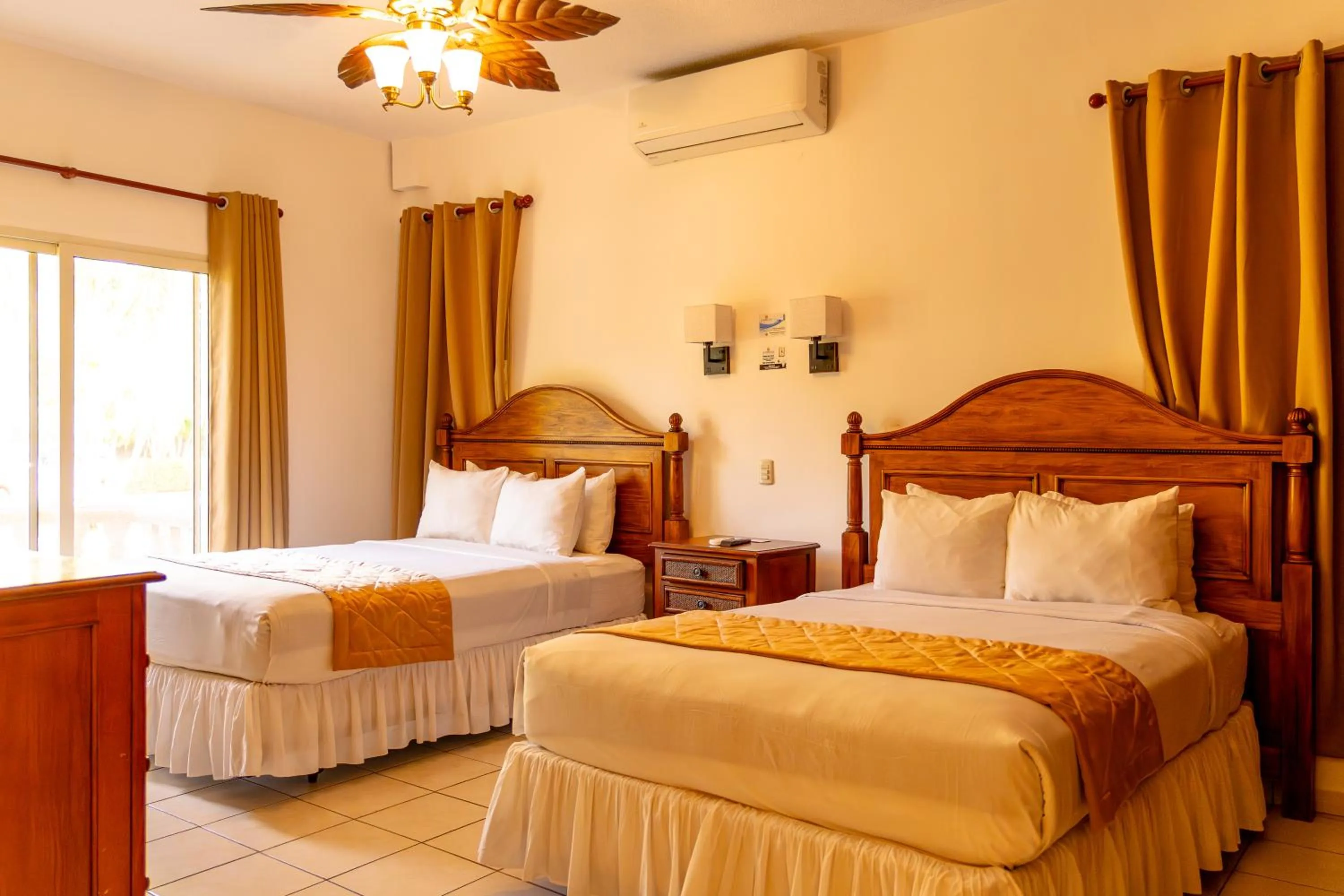 Property building, Bed in La Ensenada Beach Resort