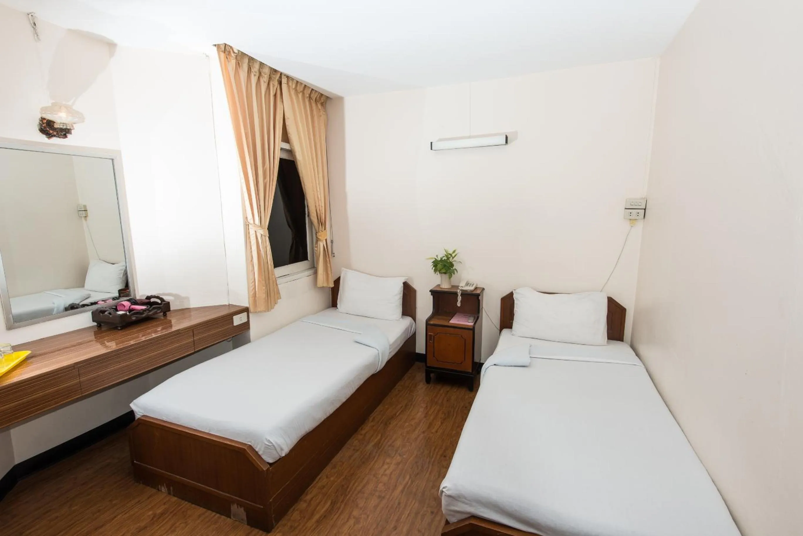 Bed in Muangphol Mansion