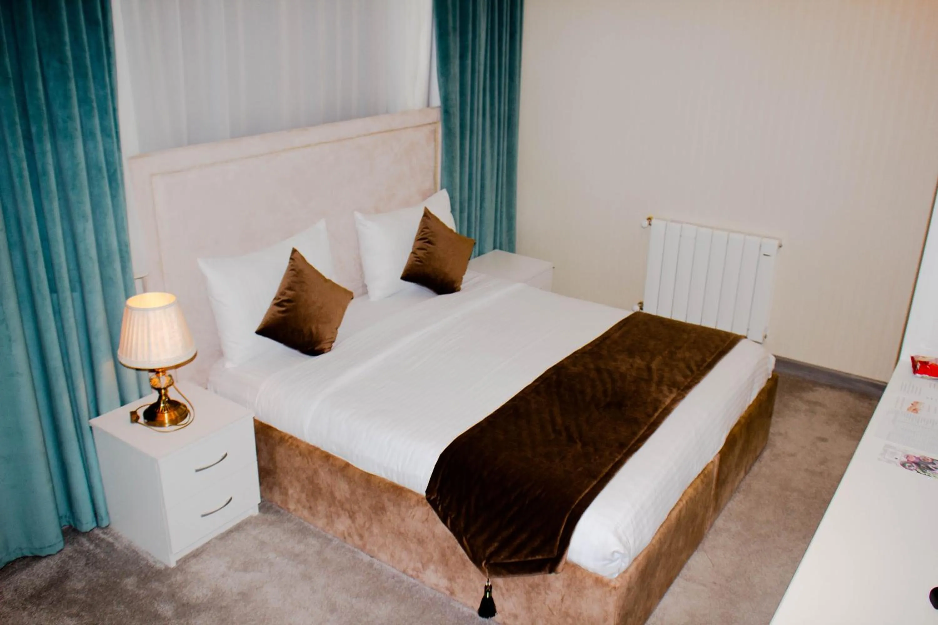 Bed in Sunday Hotel Baku