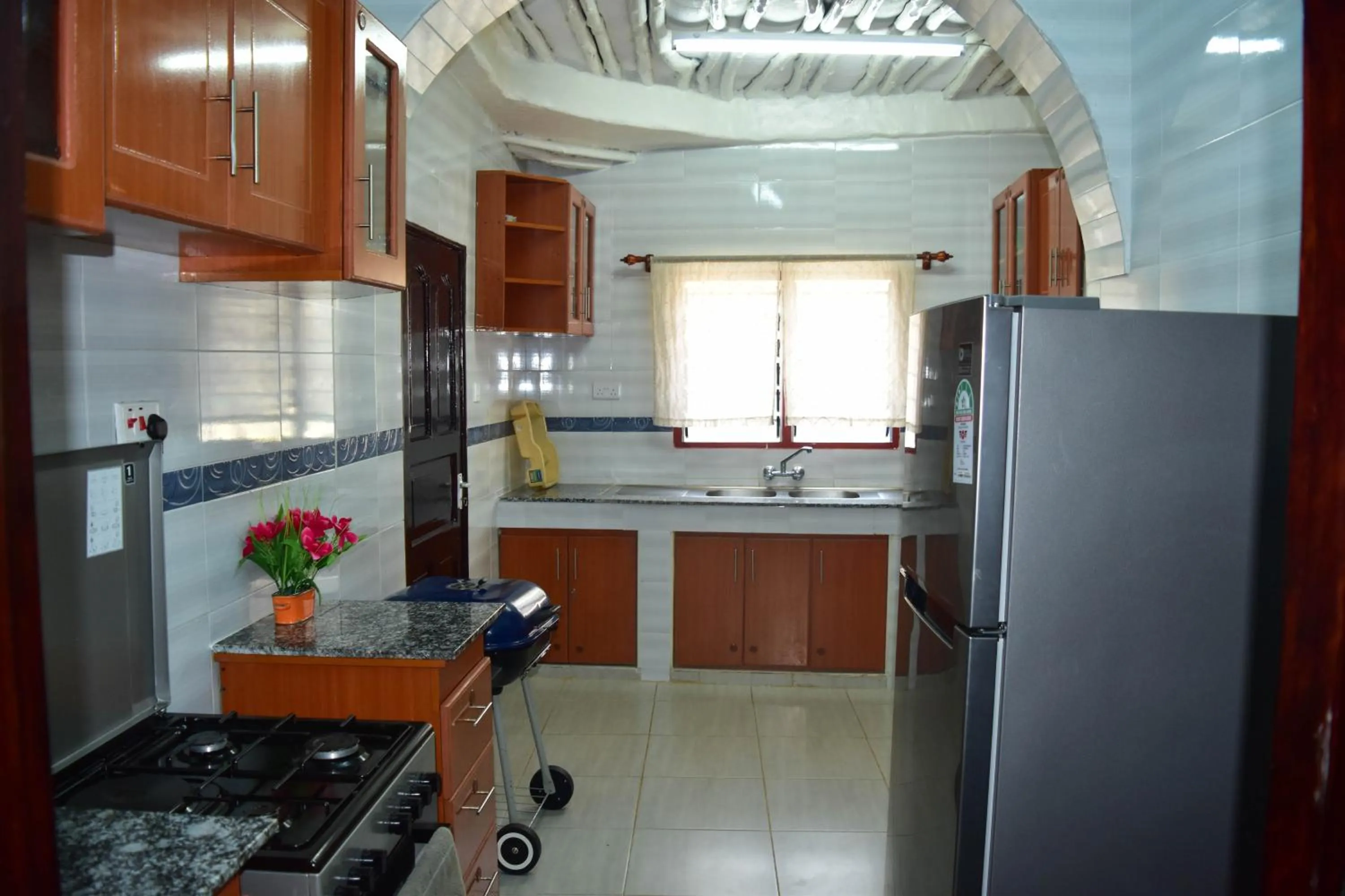 Kitchen or kitchenette in Tahira Villa