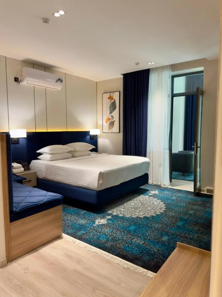 Bed in Asmald Palace Hotel