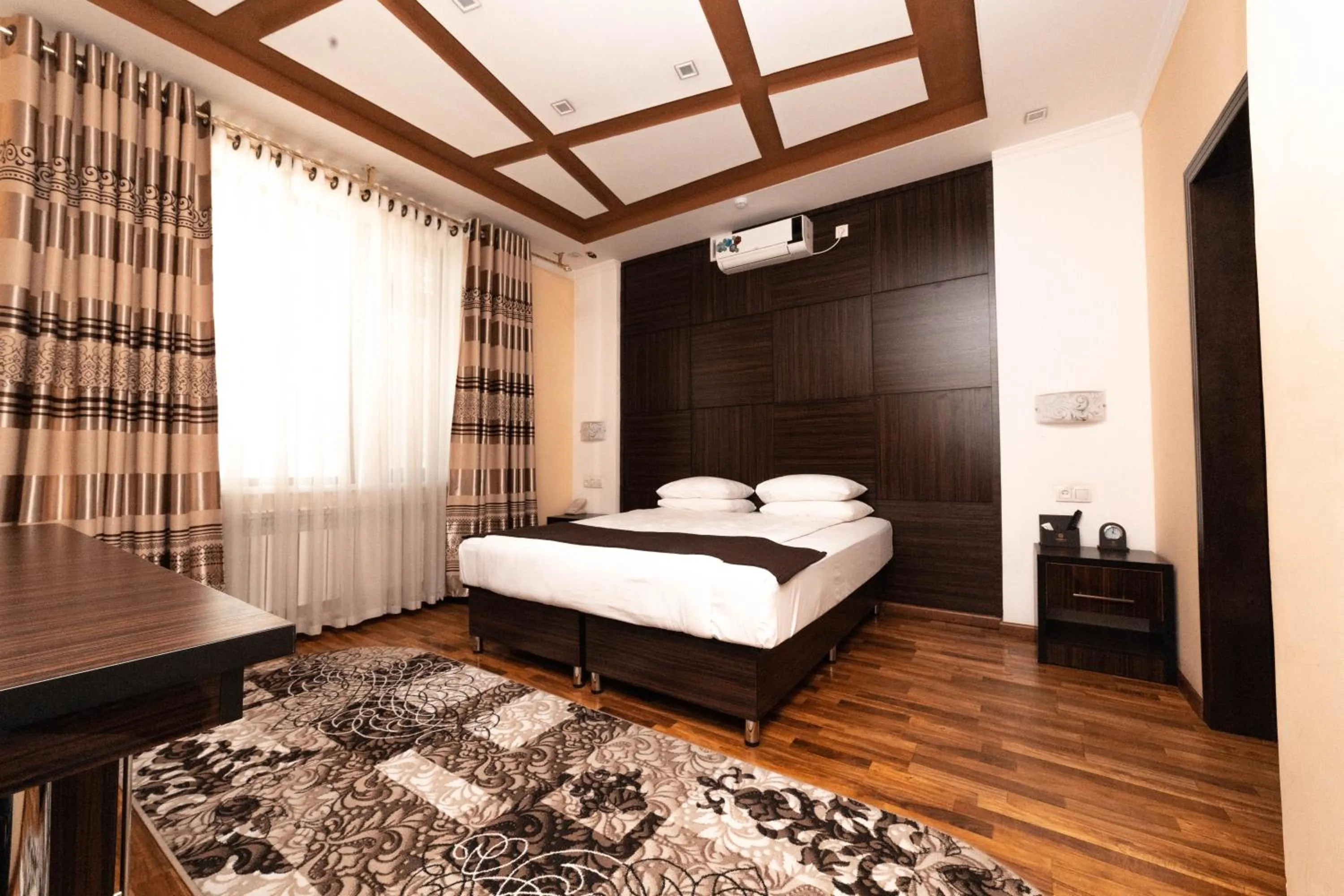 Bed in Asmald Palace Hotel