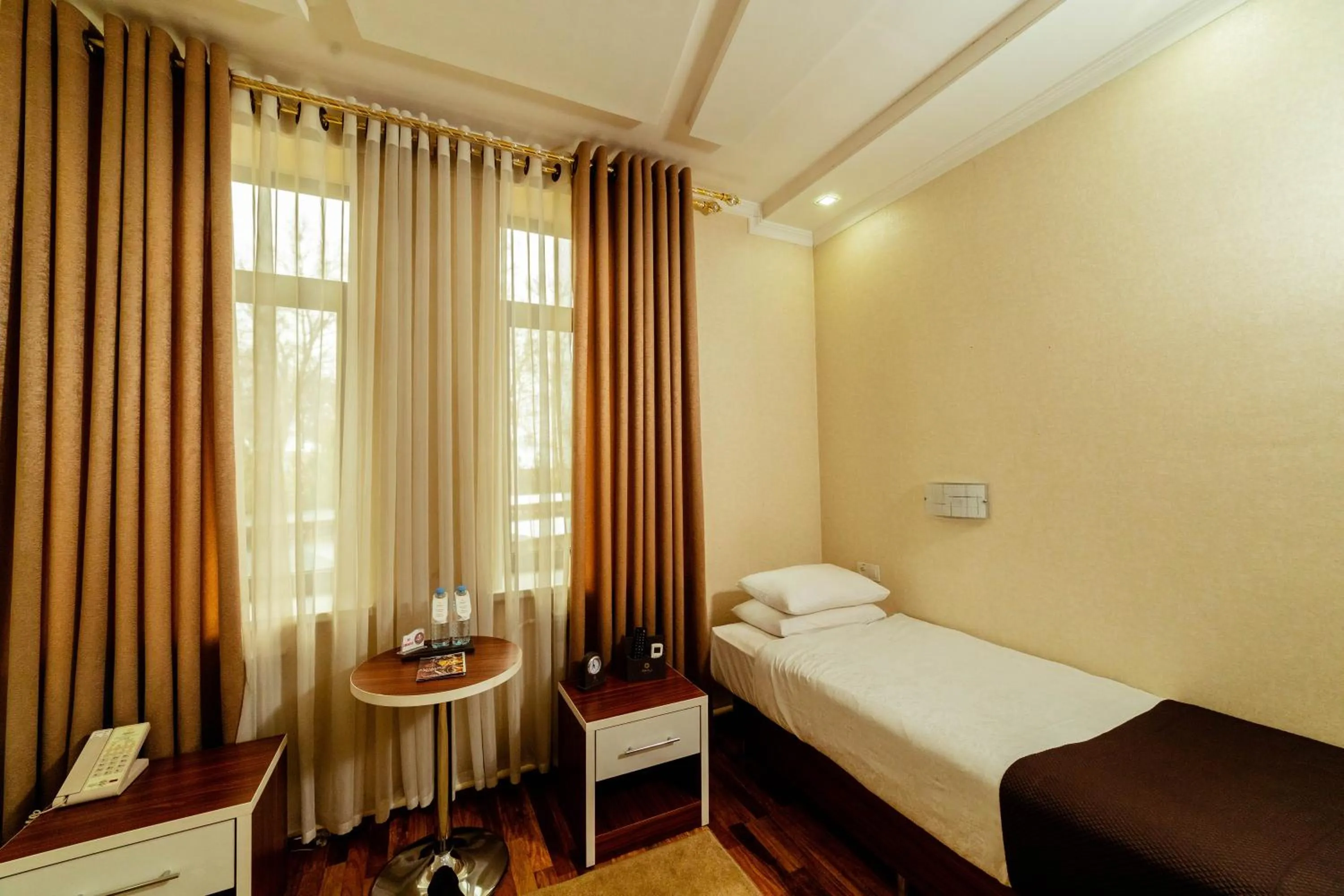 Bed in Asmald Palace Hotel