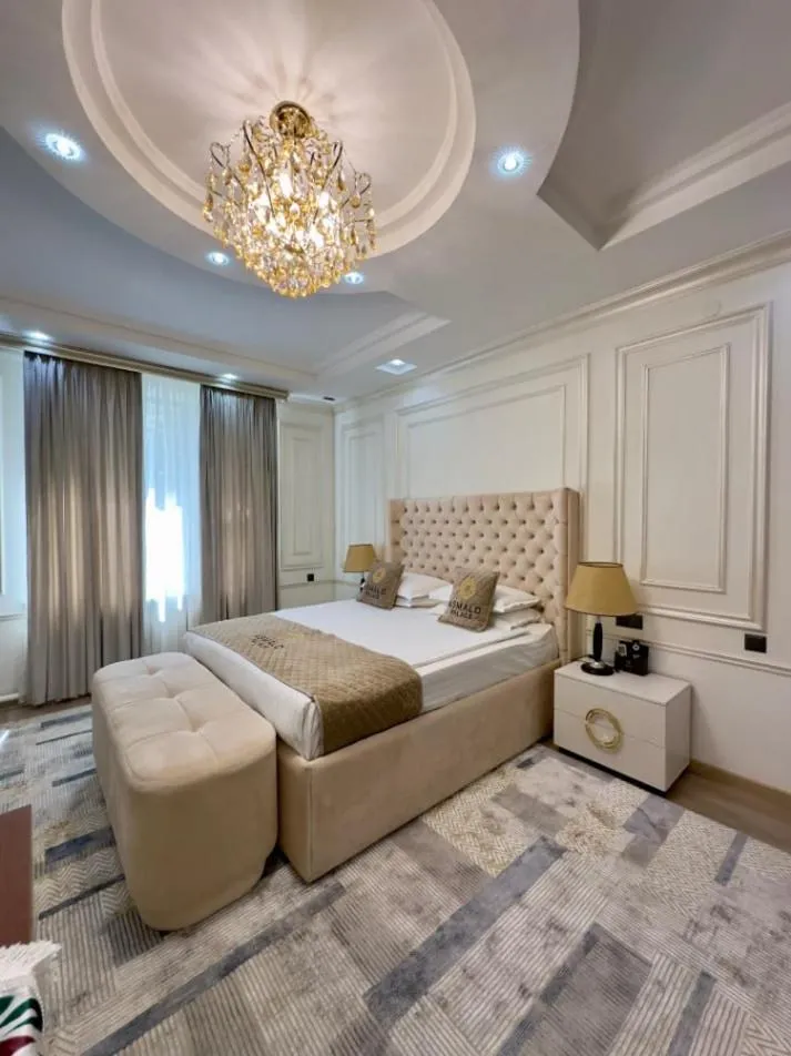 Bed in Asmald Palace Hotel