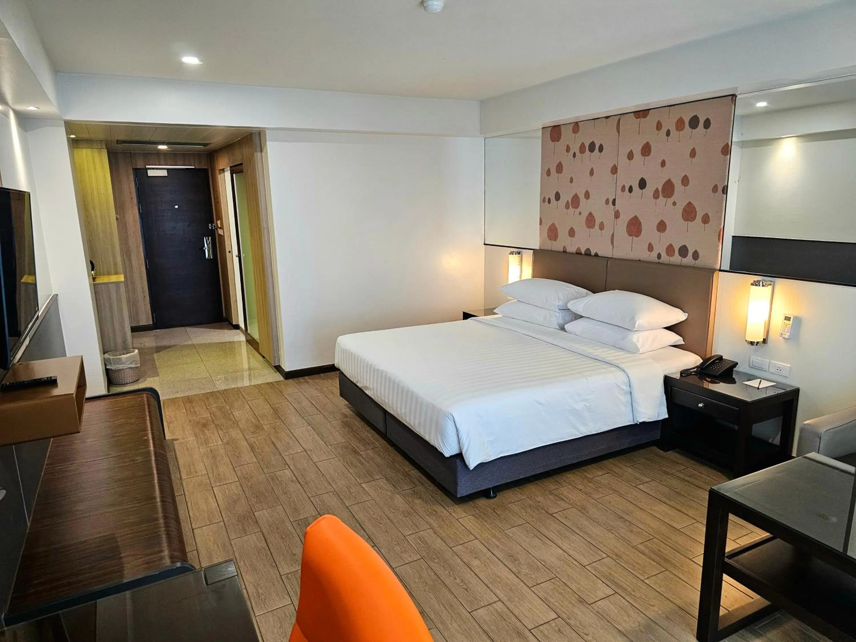 Bed in Dynasty Grande Hotel