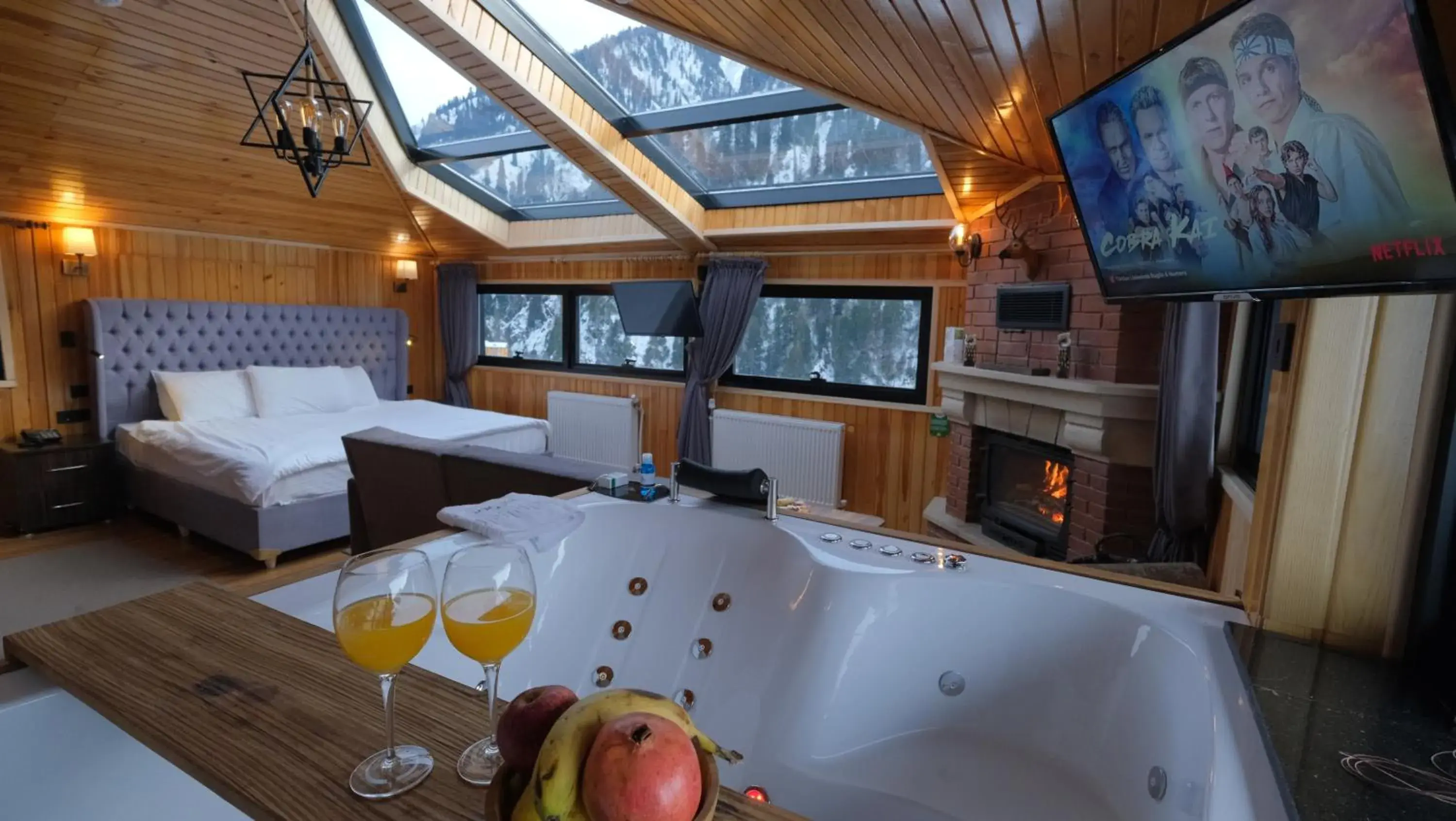 Junior Suite with Fire Place and Hot Tub - Waterfall View in Ayder Villa de Pelit Hotel Junior Suite with Fire Place and Hot Tub - Waterfall View in Ayder Villa de Pelit Hotel